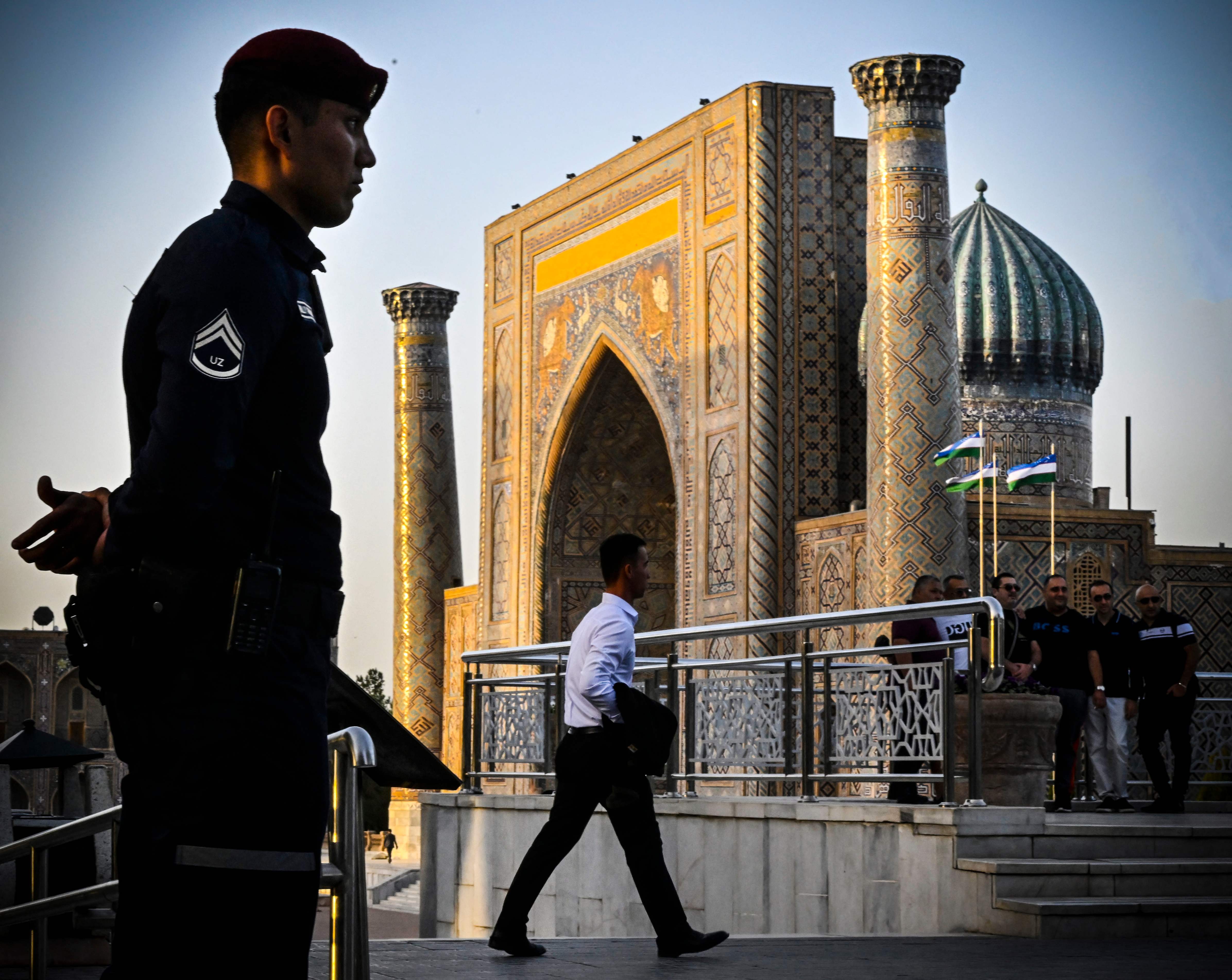 A police officer stands guard in Registan Square in downtown Samarkand