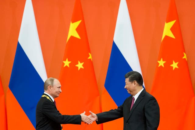 <p>Pleased to meet you: Russian president Vladimir Putin and Chinese president Xi Jinping in Beijing in 2018</p>
