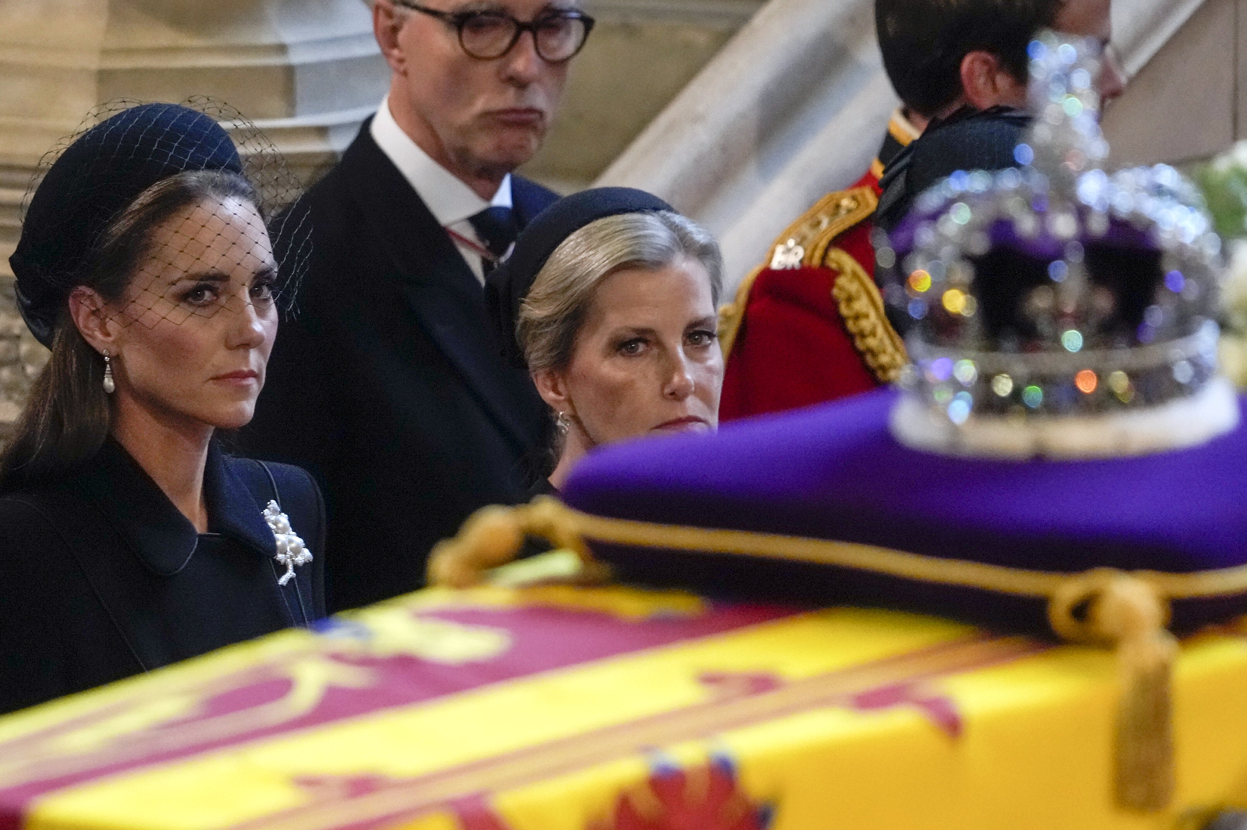 Kate wearing the brooch as she watches the Queen’s coffin pass by (Gregorio Borgia/PA)