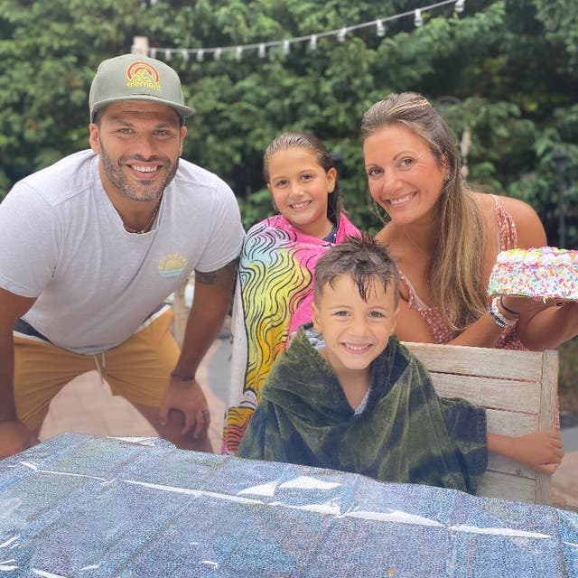 <p>Charlie DeFraia, front, poses with his family; the four-year-old nearly died when a metal straw pierced his throat</p>