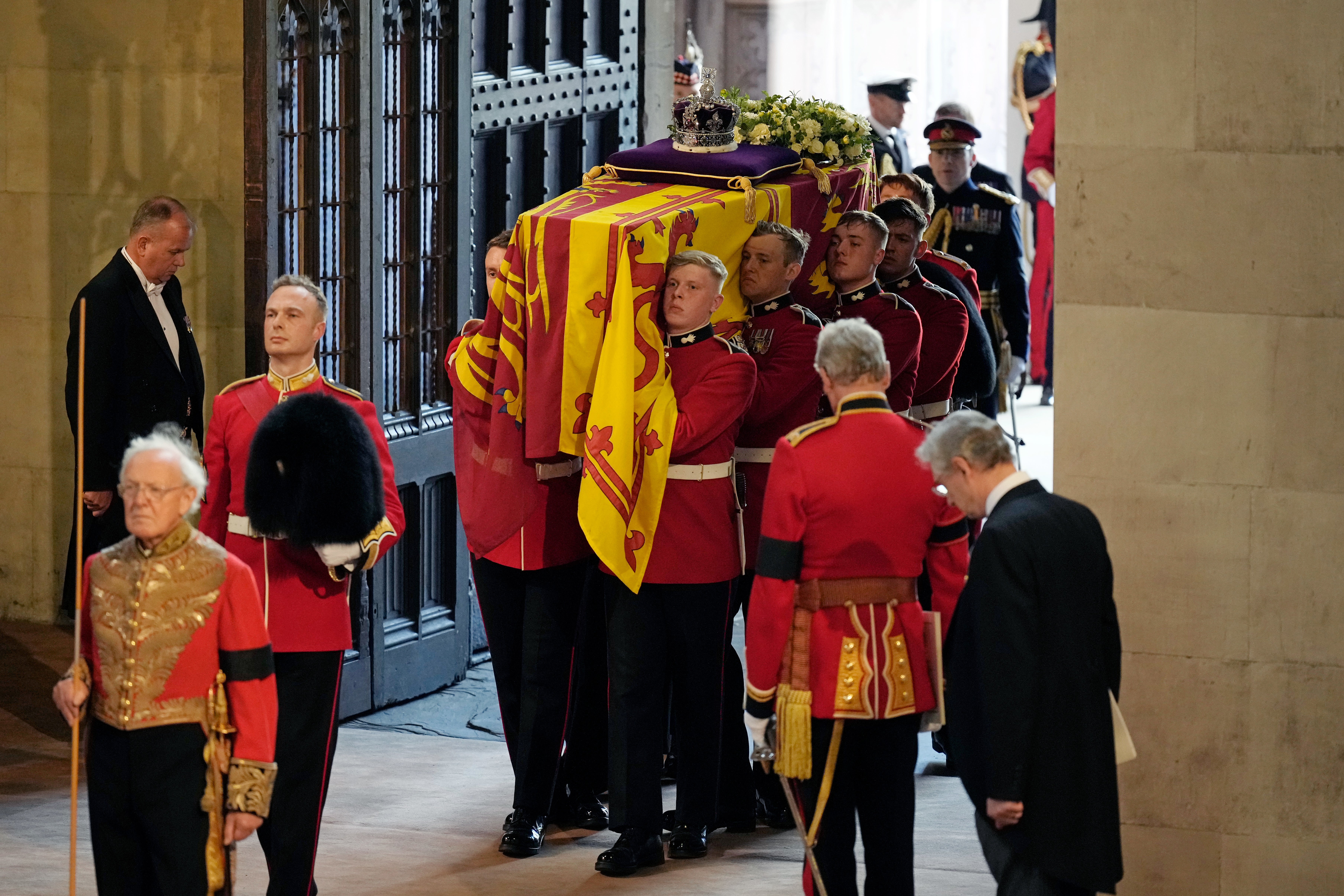 The coffin is carried into Westminster Hall for the Queen’s lying in state (Christopher Furlong/PA)