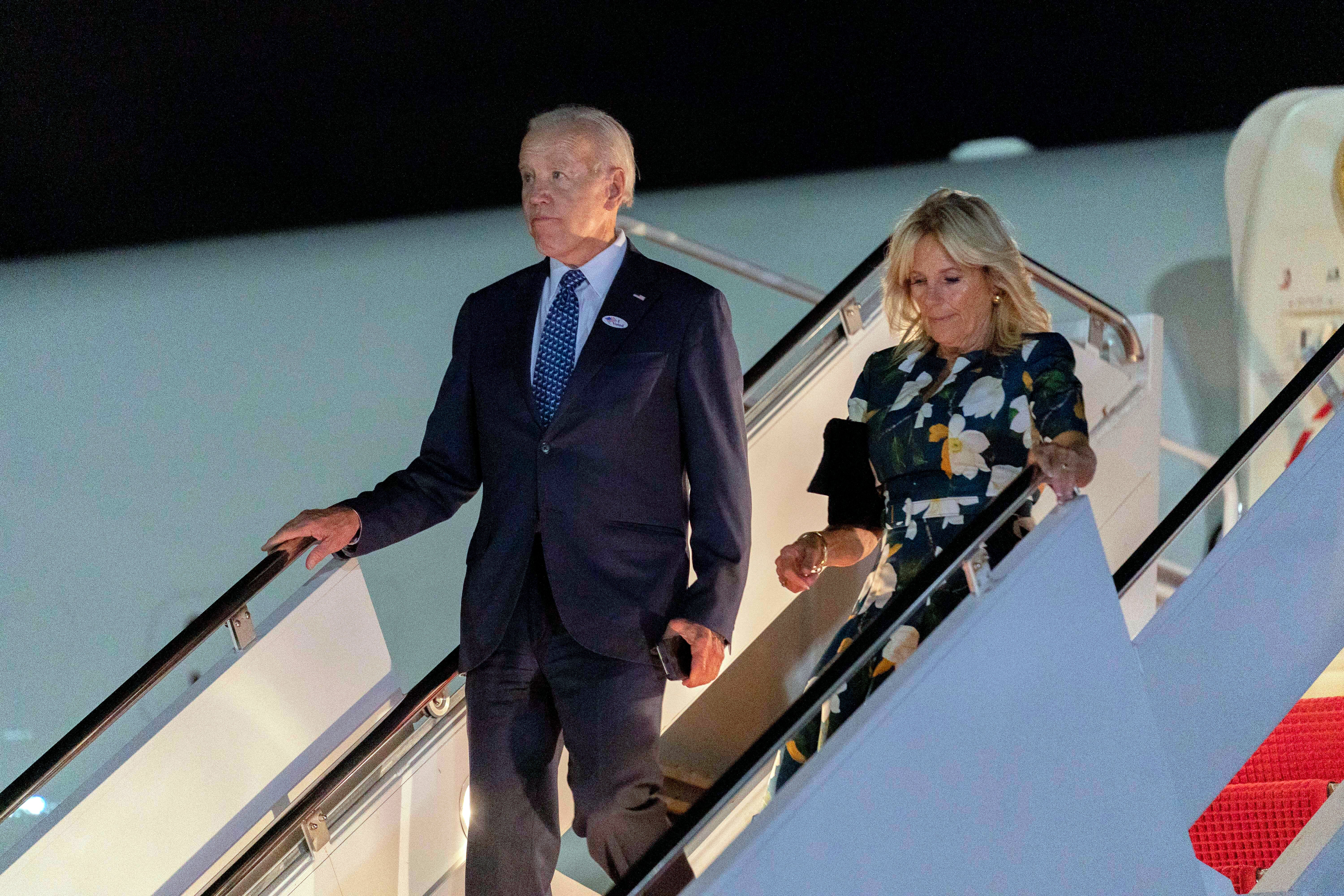 President Joe Biden and first lady Jill Biden arrive at Andrews Air Force Base, Md., Tuesday, Sept. 13, 2022, after voting in the Delaware primary.