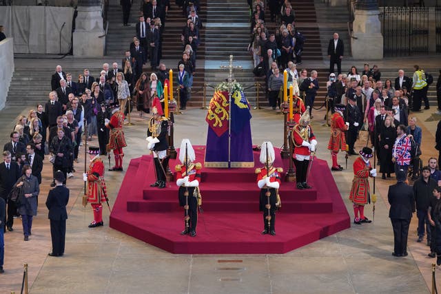 The first members of the public pay their respects to the Queen in Westminster Hall (Yui Mok/PA)