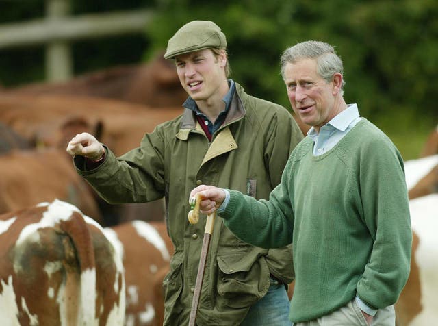 William with his father, then the Prince of Wales, during a visit to Duchy Home Farm in Gloucestershire (Chris Ison/PA)