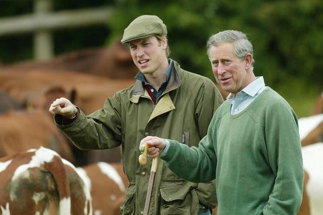 William with his father, then the Prince of Wales, during a visit to Duchy Home Farm in Gloucestershire (Chris Ison/PA)