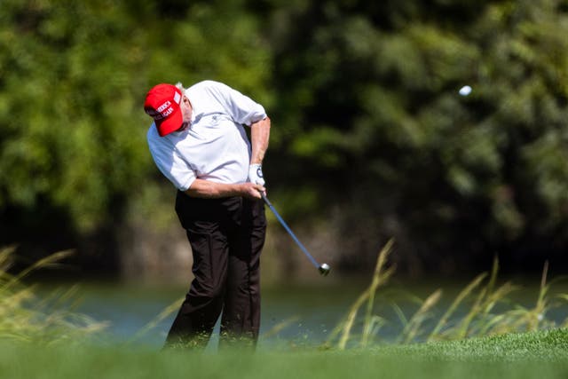 <p>Donald Trump plays golf at the Trump National Golf Club in Sterling, Virginia</p>