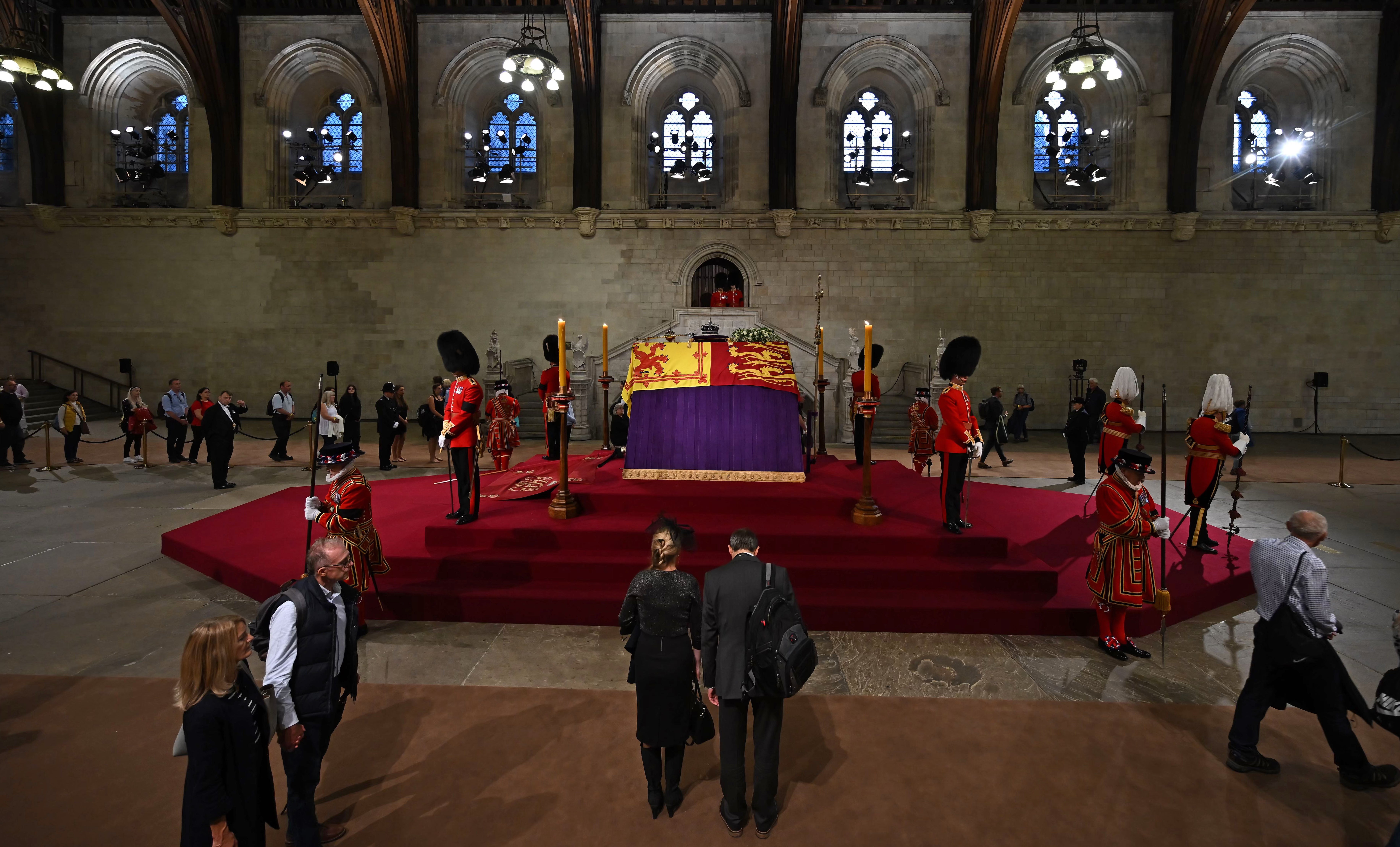 Members of the public file past the the coffin of Queen Elizabeth II (Ben Stansall/PA)