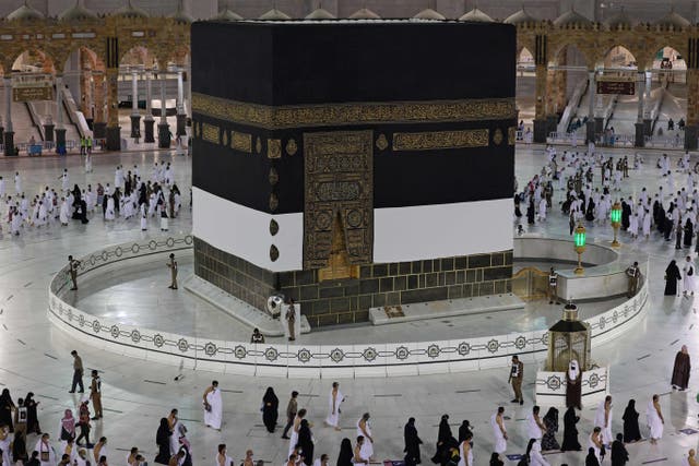 <p>Muslim pilgrims circumambulate around the Kaaba, Islam’s holiest shrine in Mecca, Saudi Arabia</p>