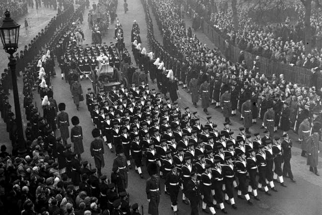 The funeral cortege of King George VI moves to Paddington station in London (PA)