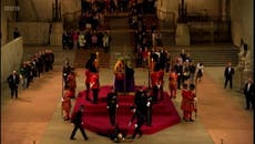 Royal guard collapses next to Queen’s coffin on first night of lying-in-state