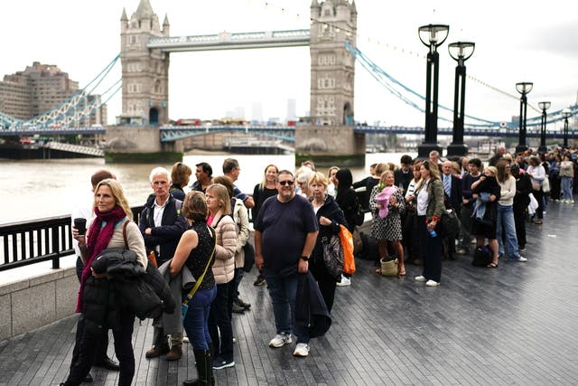 The queue on the South Bank near to Tower Bridge (Aaron Chown/PA)