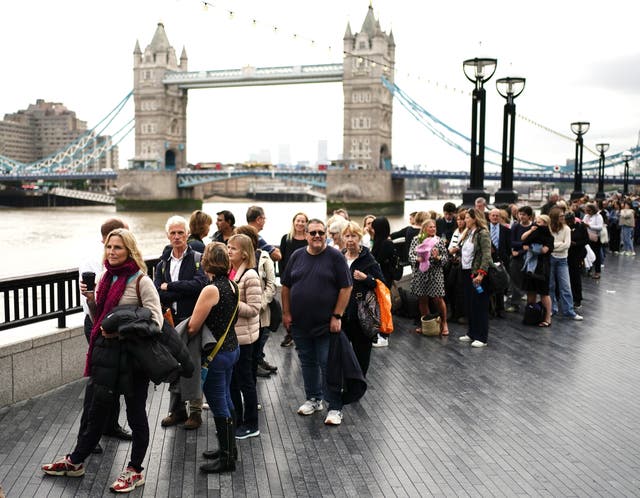 The queue on the South Bank near to Tower Bridge (Aaron Chown/PA)