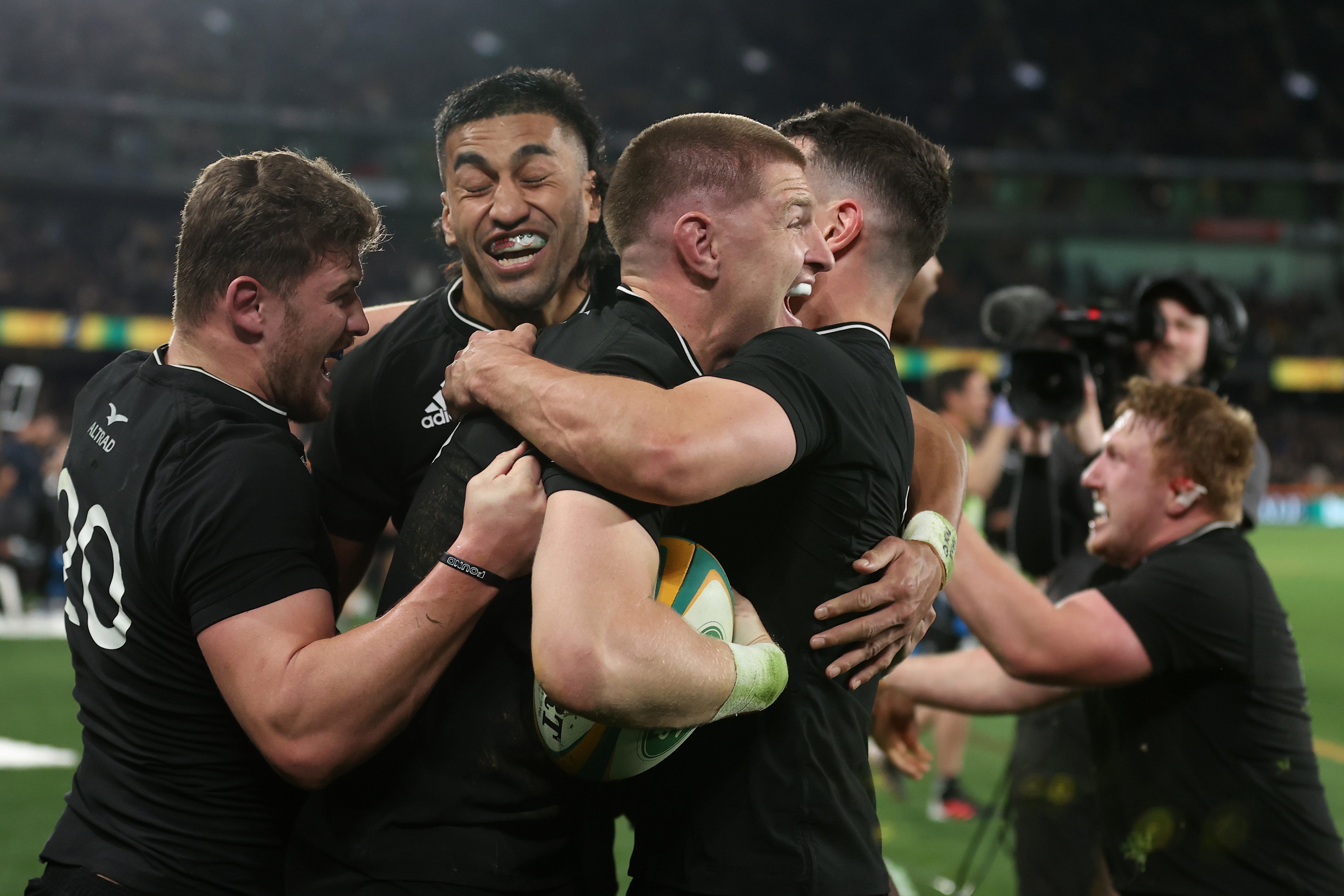 Jordie Barrett of the All Blacks celebrates with teammates after scoring the match-winning try between the Australia Wallabies and the New Zealand All Blacks at Marvel Stadium on 15 September