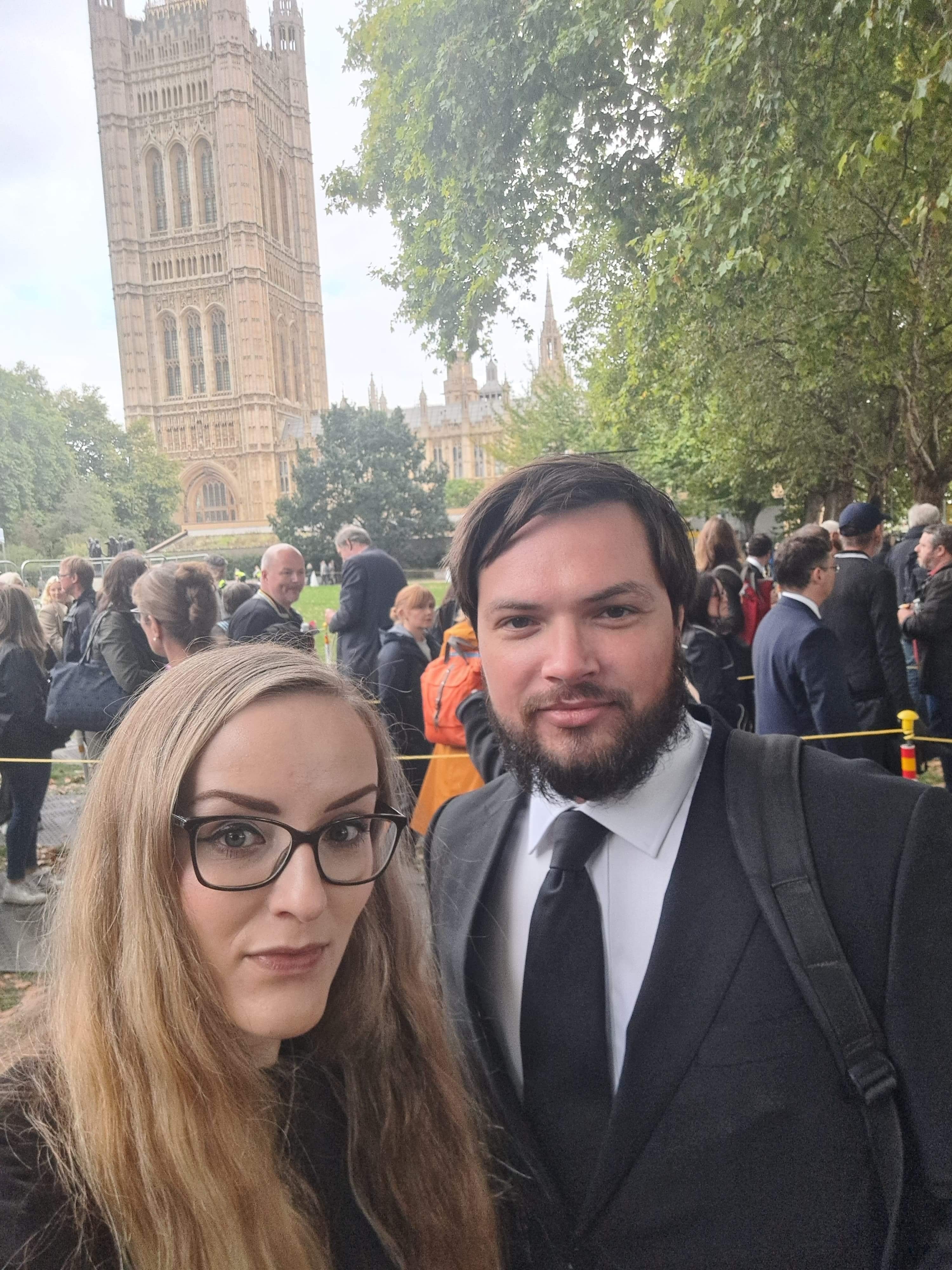PA reporter Chris McKeon and Sian Elvin wait in the queue at Victoria Gardens to see the Queen’s lying in state. (PA Wire)