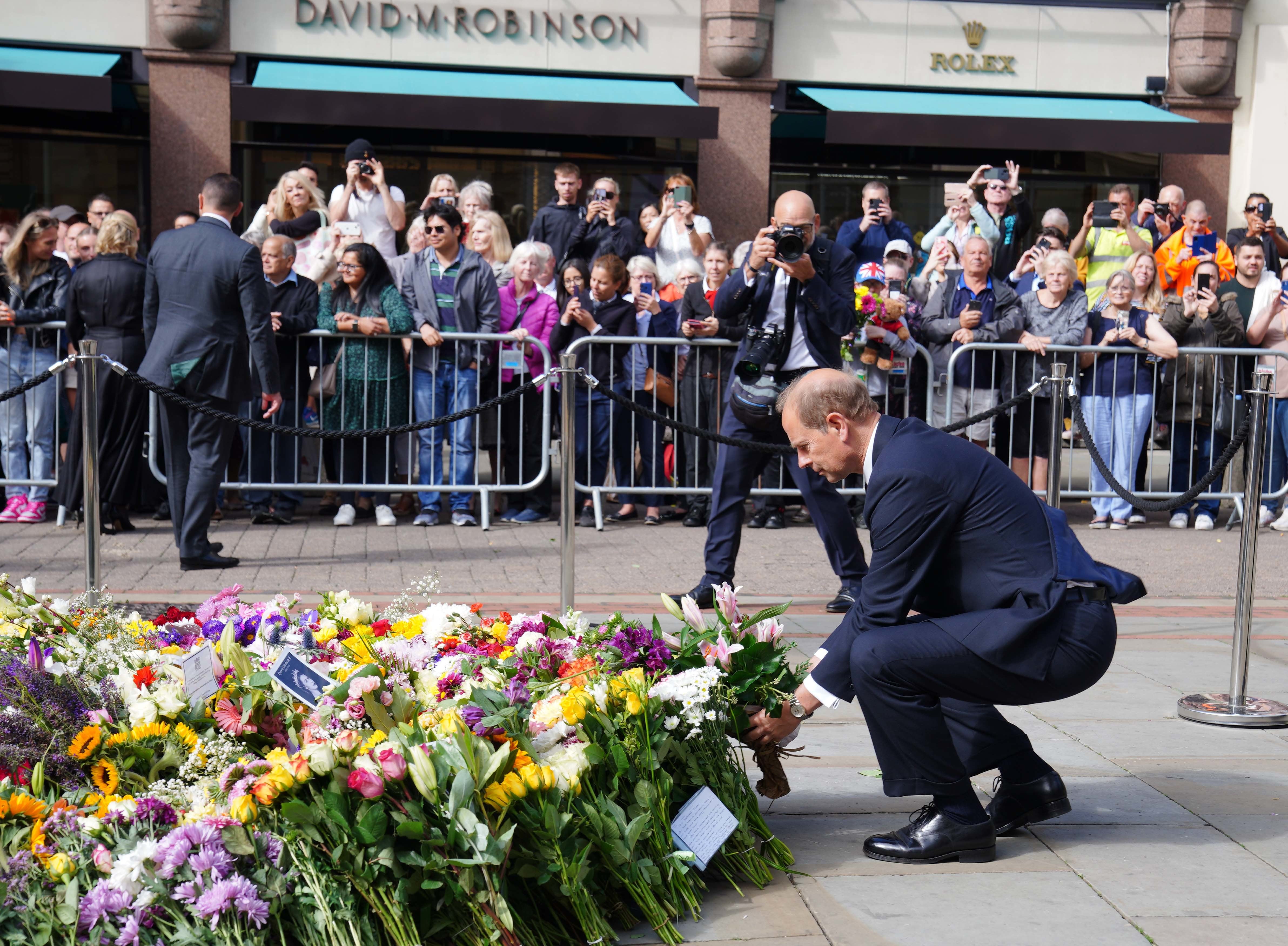 The Earl of Wessex lays a floral tribute in St Ann’s Square, Manchester, following the death of the Queen (Peter Byrne/PA)