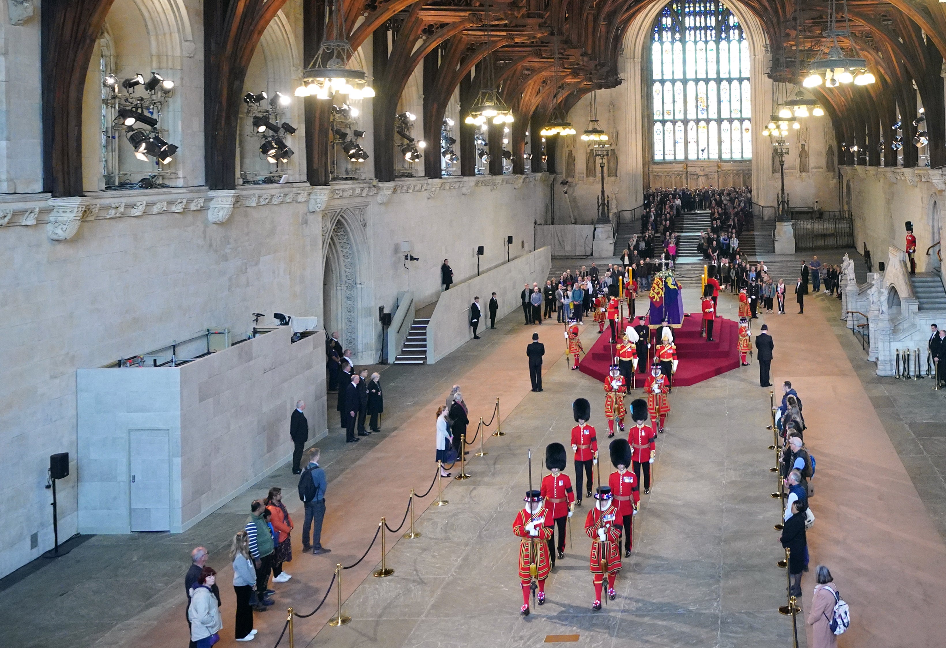 The old guard leaves after standing vigil around the Queen’s coffin in Westminster Hall during her lying in state (Yui Mok/PA)
