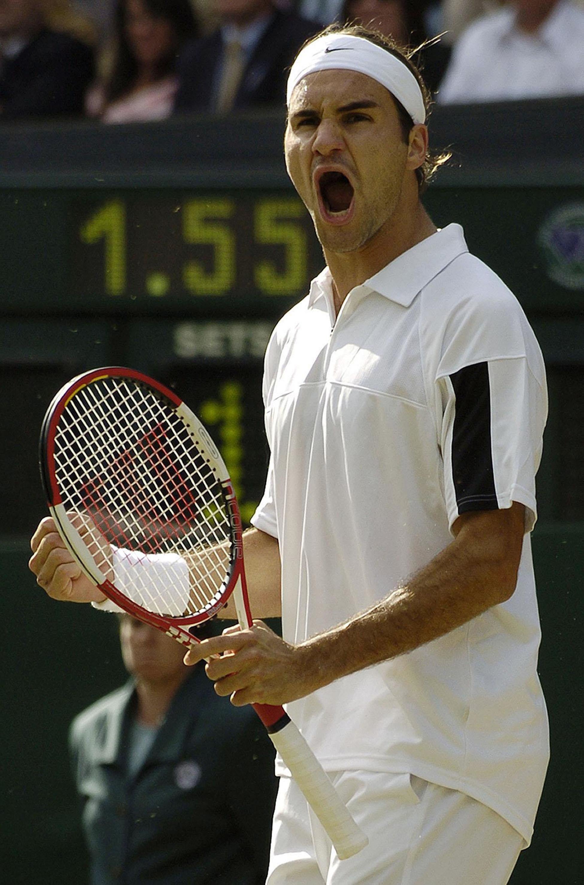 In 2004, Federer earned his second title at SW19 with victory over Andy Roddick (PA Archive)