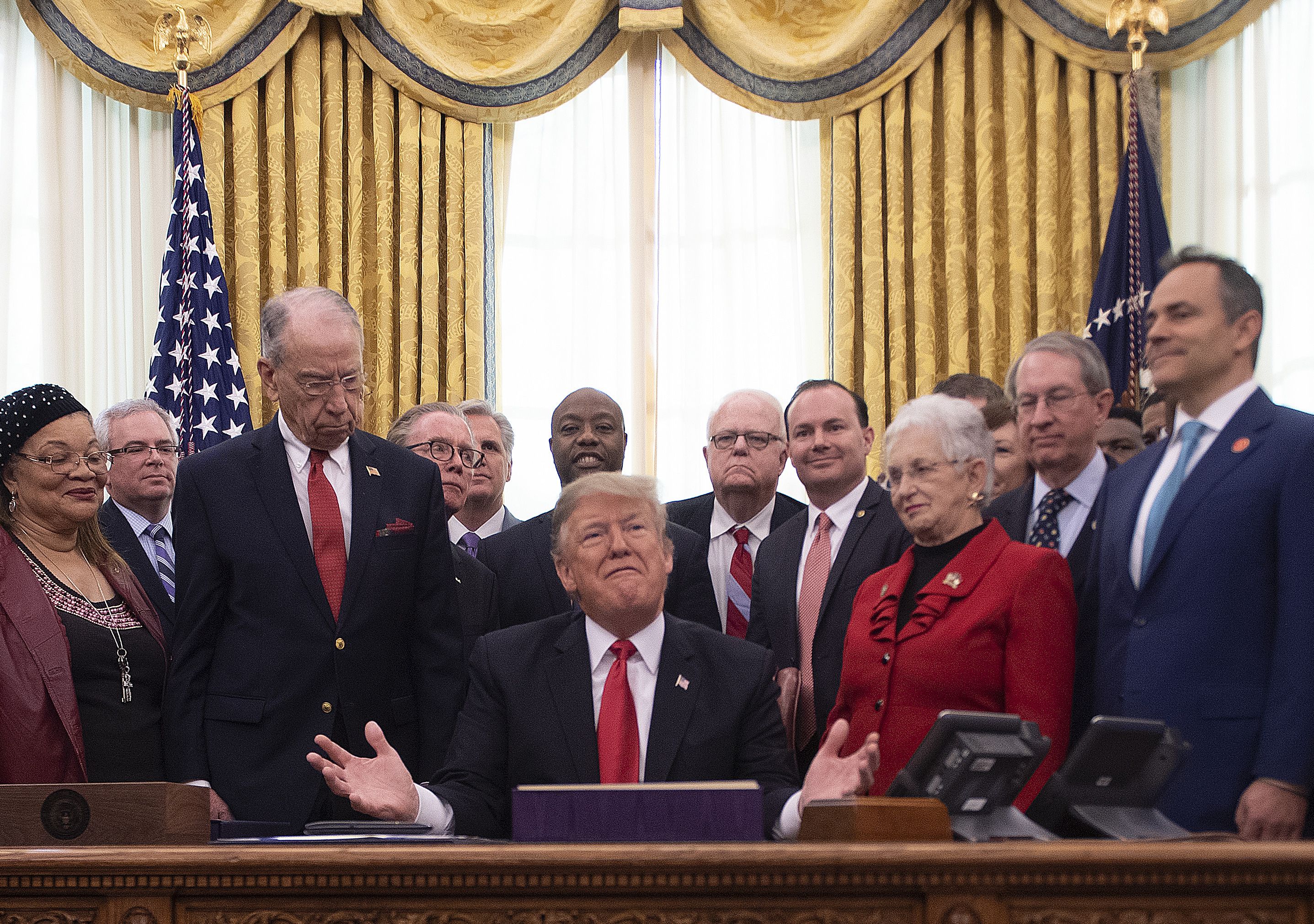 Then-President Donald Trump signs the First Step Act into law on 21 December, 2018.