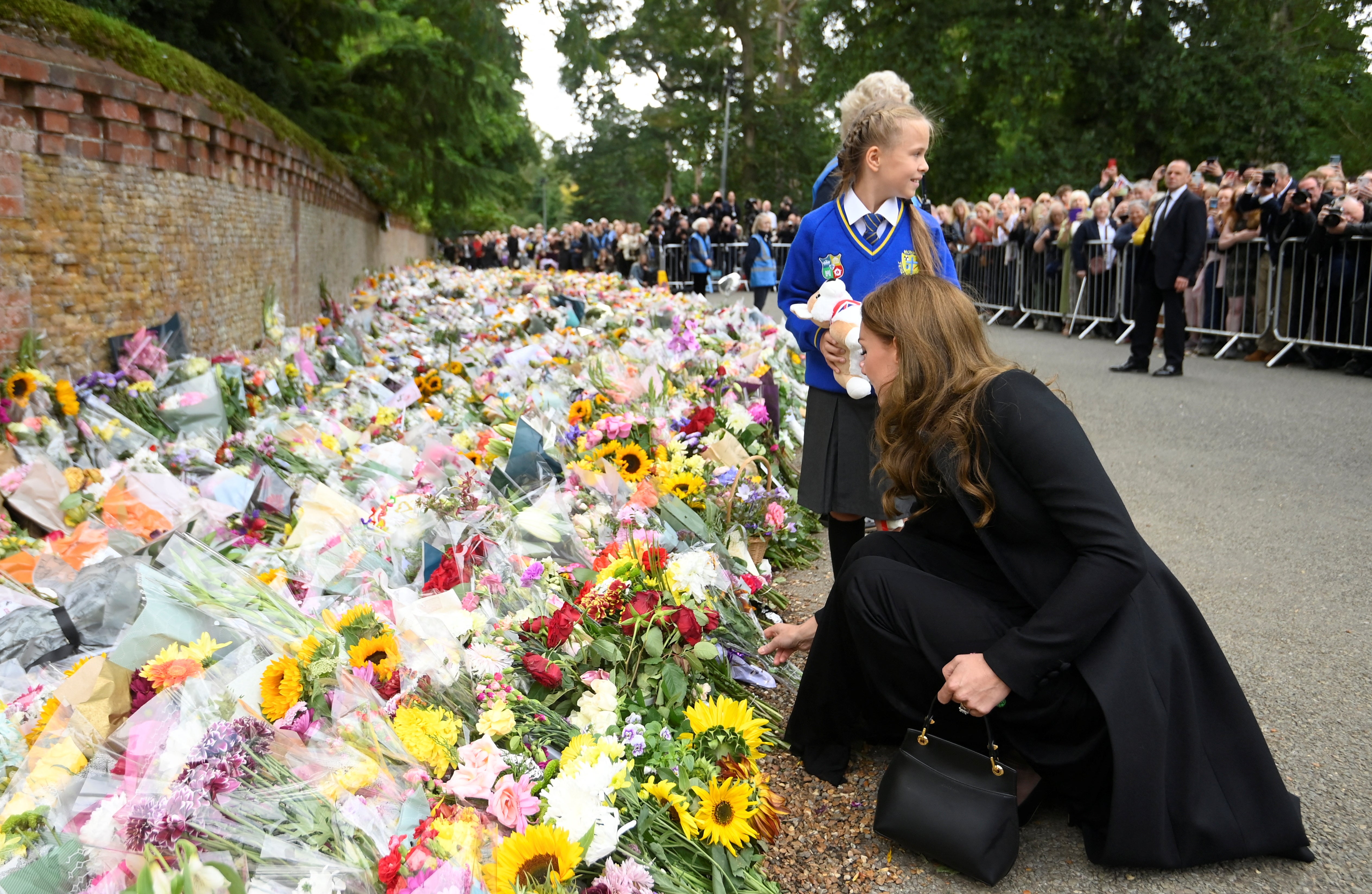 The Princess of Wales views the floral tributes (Toby Melville/PA)