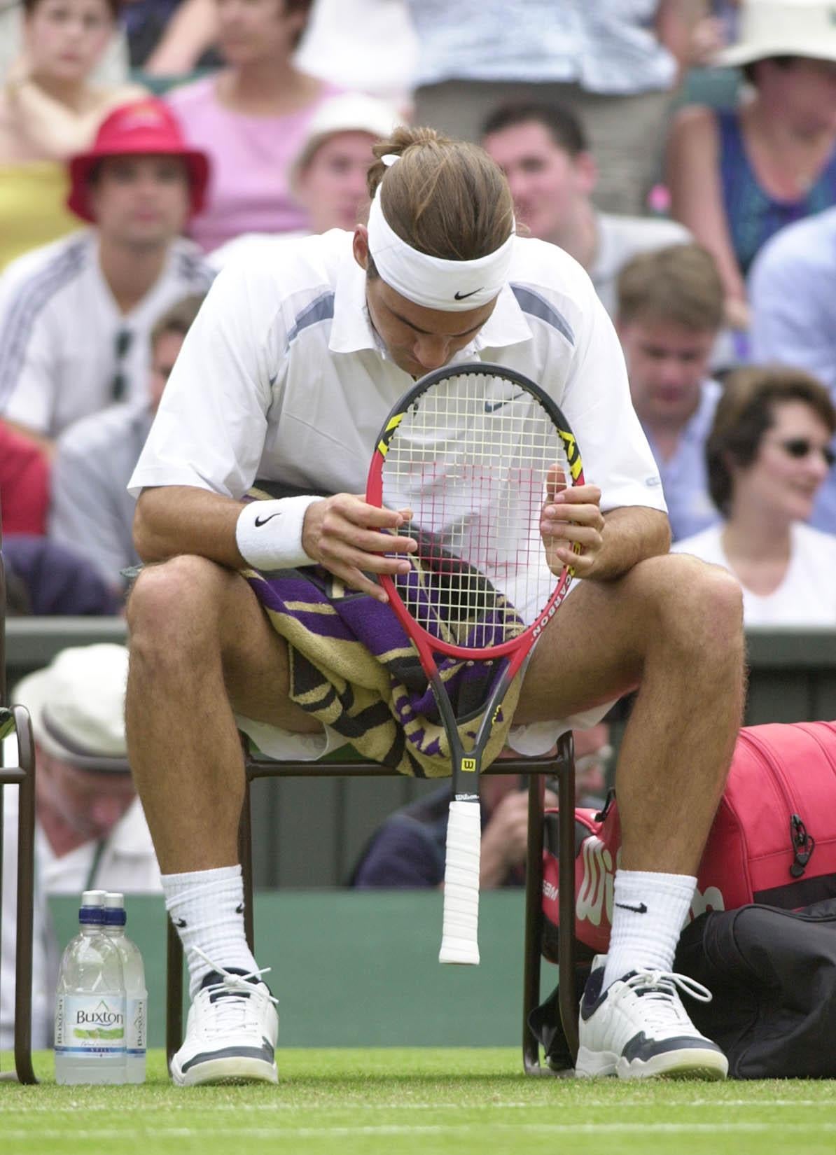 In 2002, Federer crashed out in the first round after losing in straight sets to Mario Ancic (Rebecca Naden/PA)