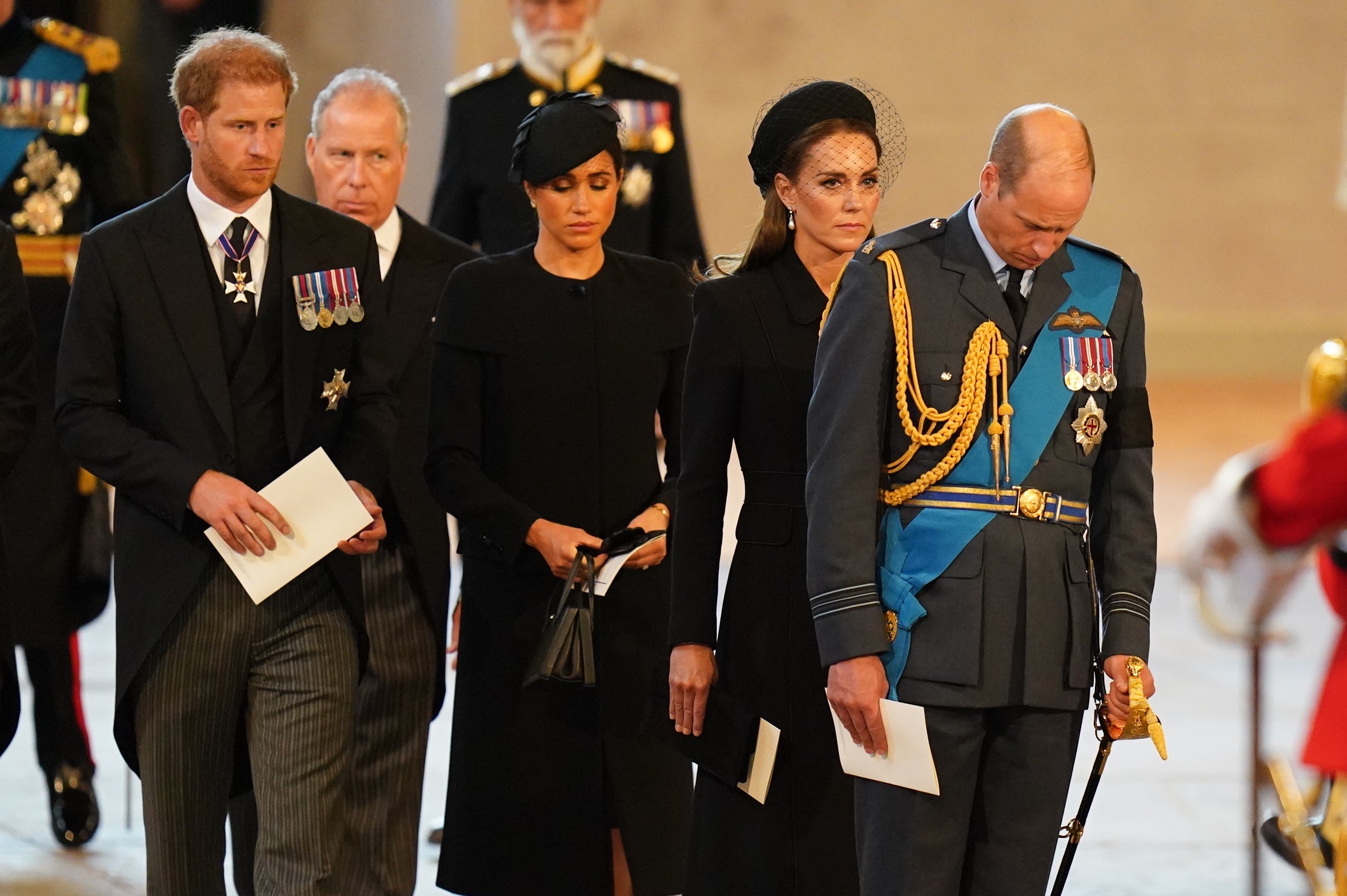 Harry, Meghan, Kate and William follow the coffin into Westminster Hall (Jacob King/PA)