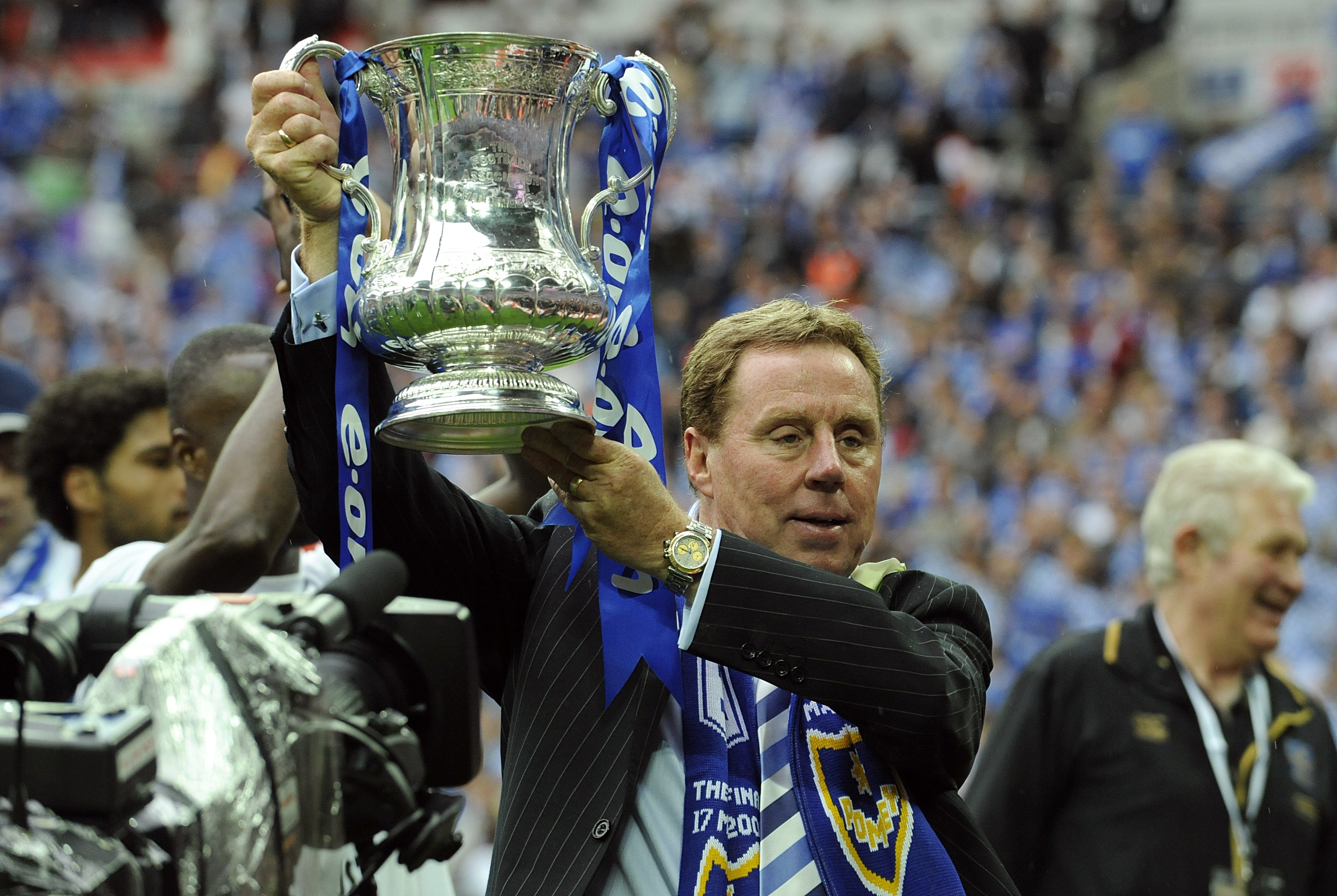 Redknapp lifts the FA Cup with Portsmouth (Rebecca Naden/PA)