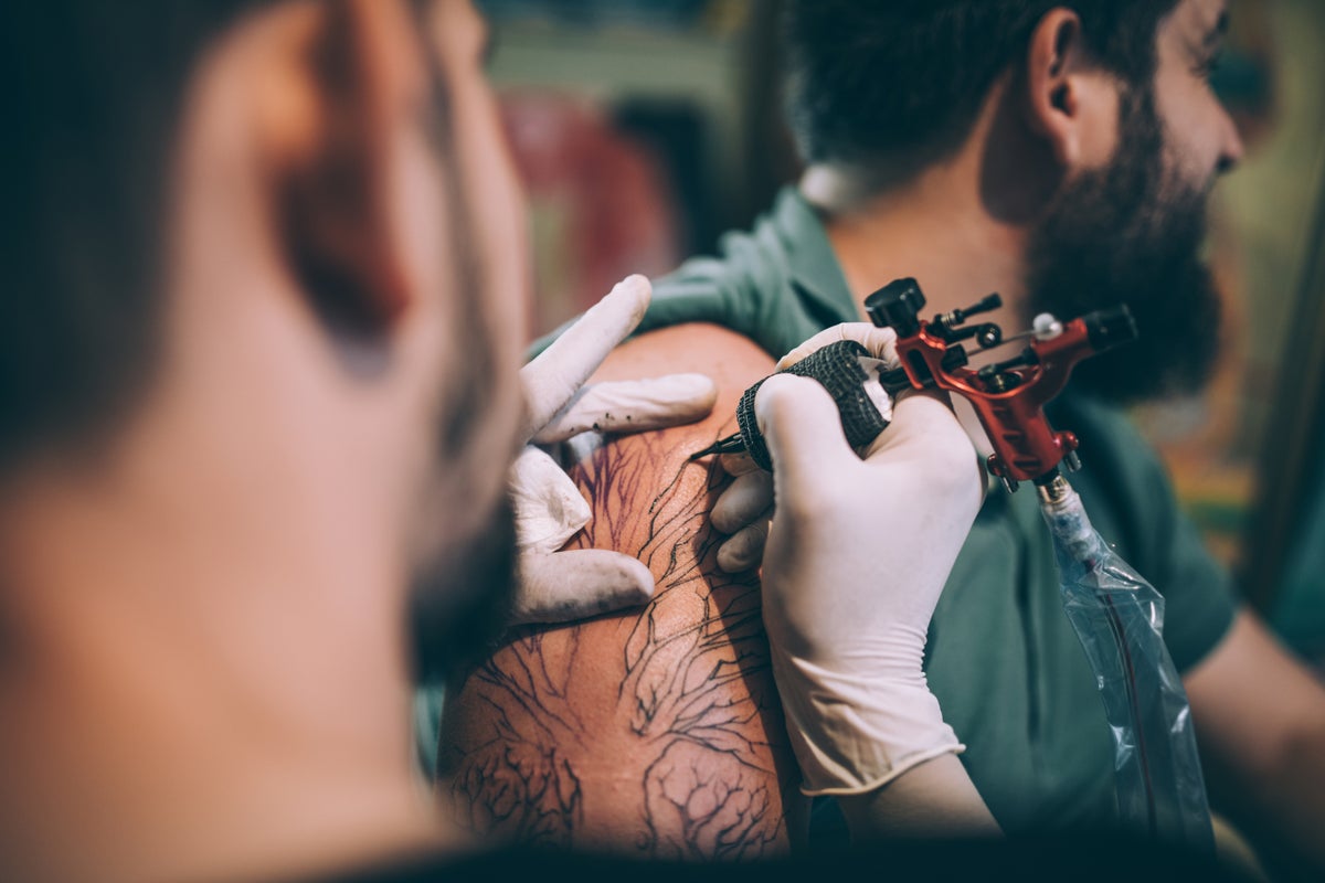 Scientists develop painless and bloodless tattoos that can be  self-administered | The Independent
