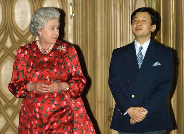 <p>Queen Elizabeth II  escorts the then Crown Prince Naruhito of Japan through the Great Hall in Windsor Castle 19 May 2001 </p>