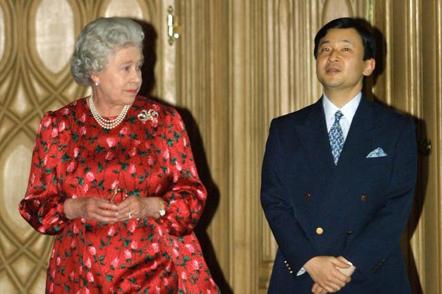 <p>Queen Elizabeth II  escorts the then Crown Prince Naruhito of Japan through the Great Hall in Windsor Castle 19 May 2001 </p>