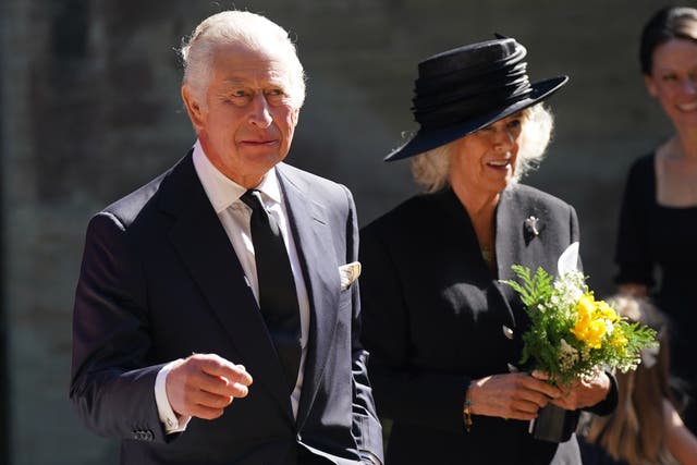 King Charles III and the Queen Consort leave Llandaff Cathedral in Cardiff, following a service of prayer and reflection for the life of Queen Elizabeth II (Jacob King/PA)
