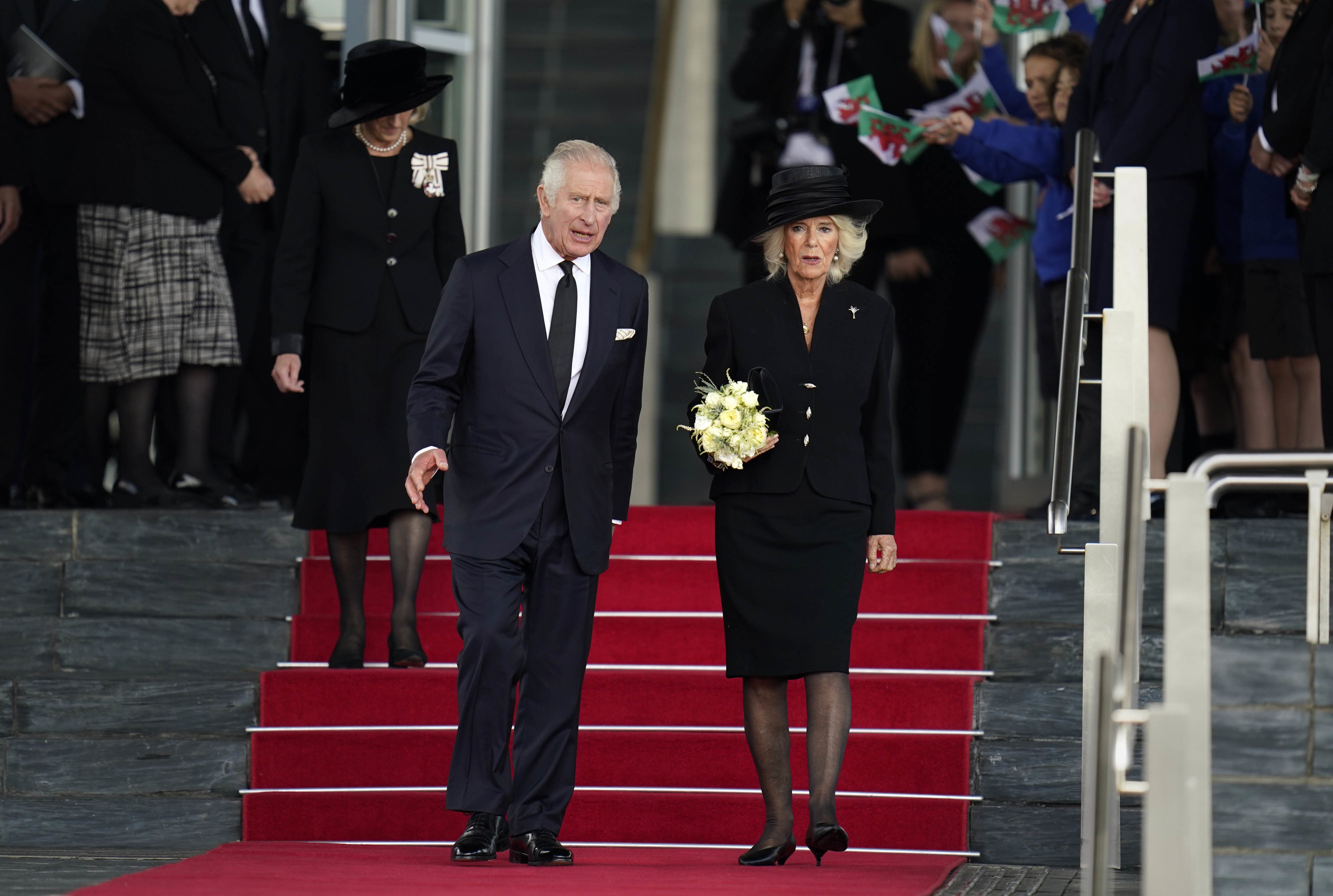 Charles and Camilla leave the Senedd in Cardiff (Andrew Matthews/PA)