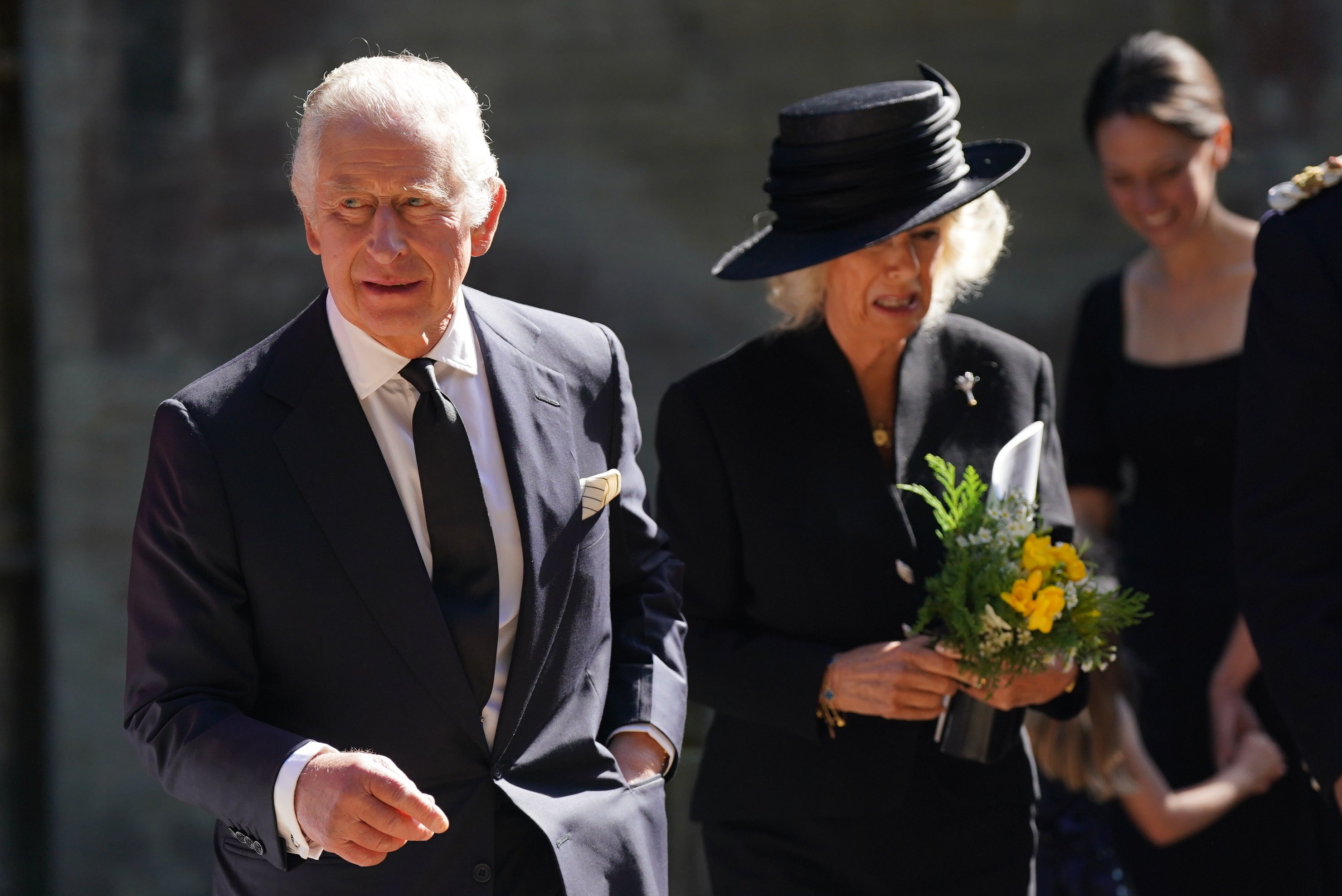Charles and Camilla leave Llandaff Cathedral after the memorial service for the Queen (Jacob King/PA)