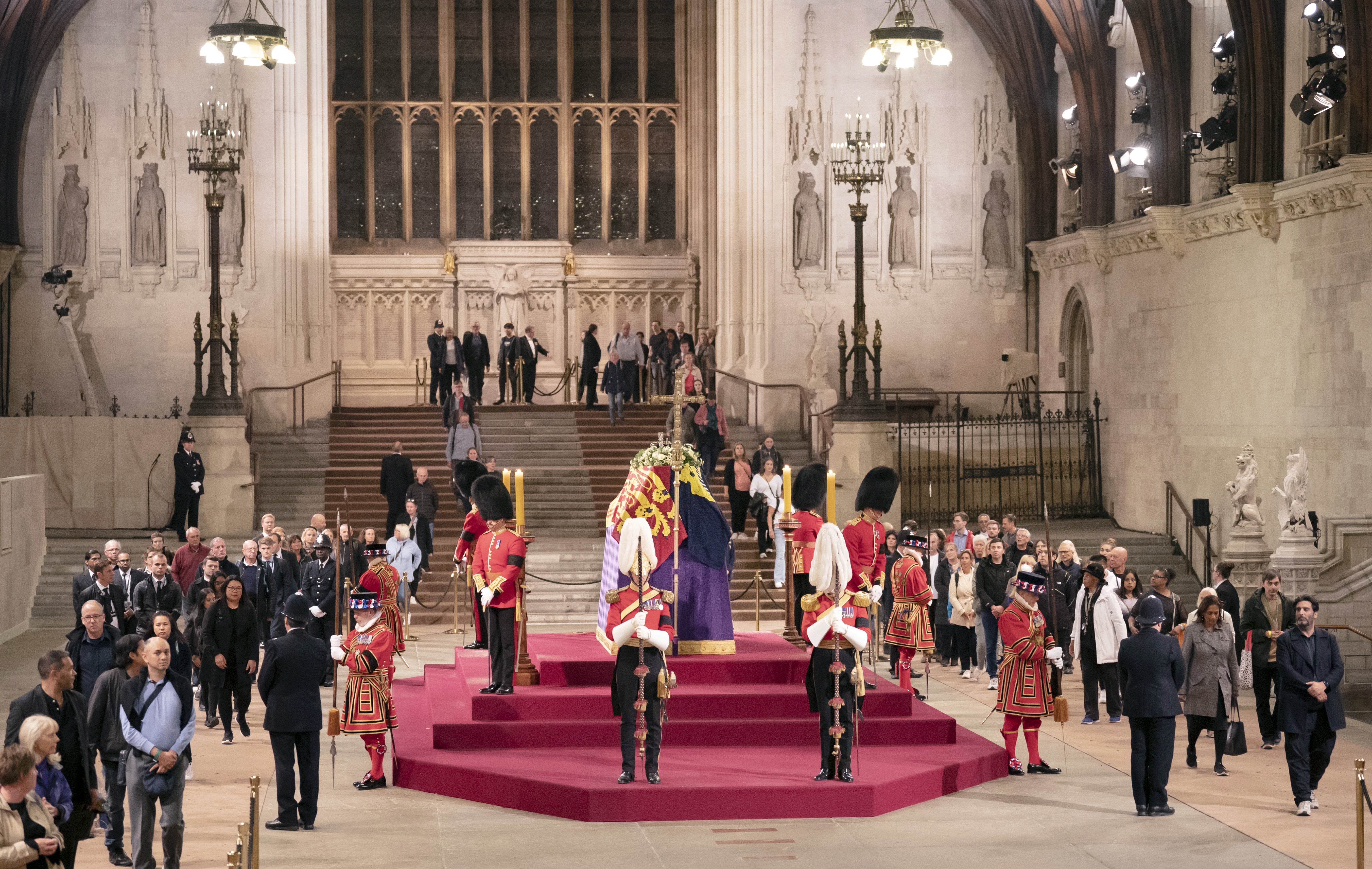 Members of the public file past the coffin of Queen Elizabeth II lying in state on the catafalque in Westminster Hall (Danny Lawson/PA)