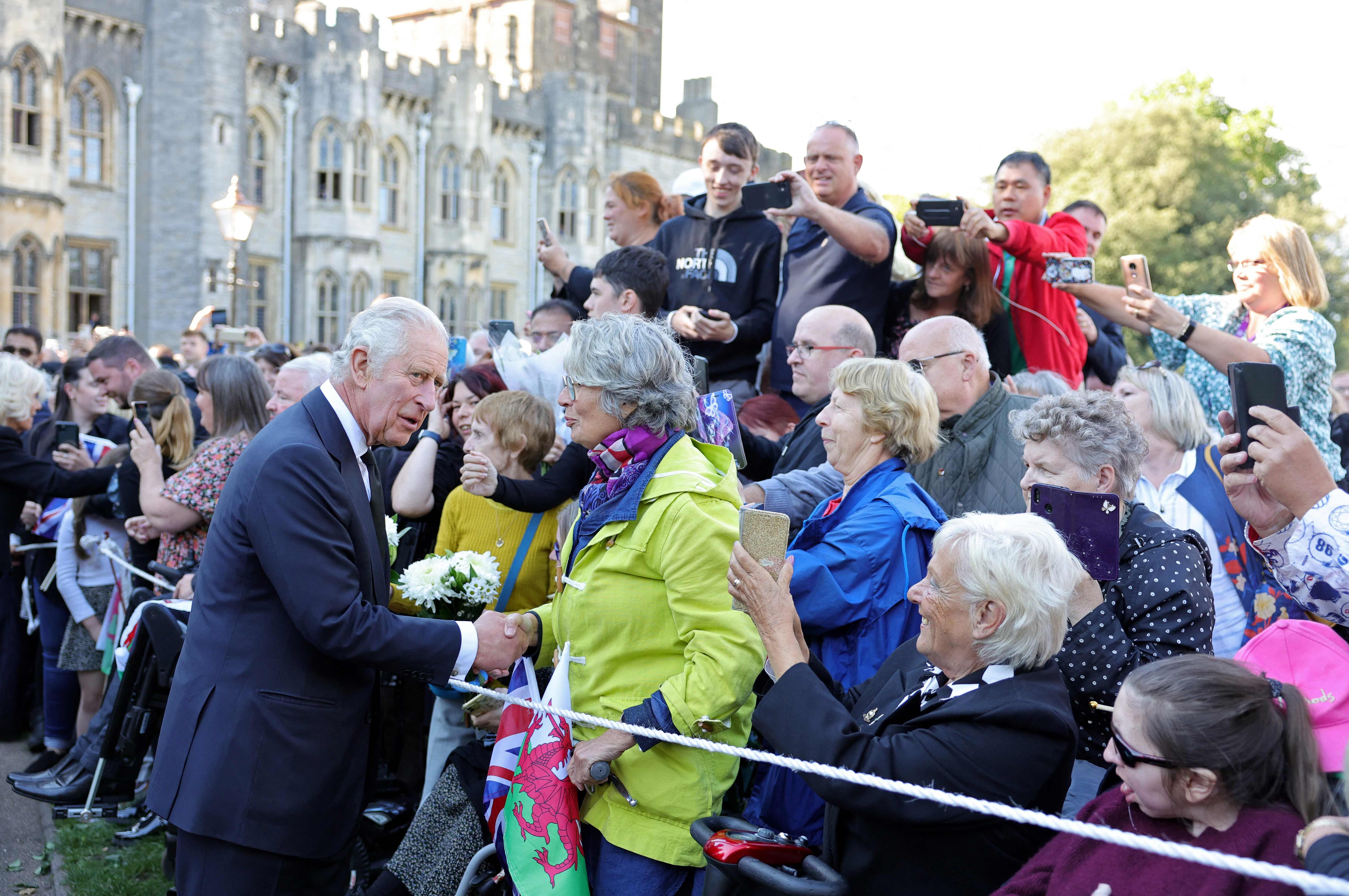 King Charles III greets the public during a visit at Cardiff Castle