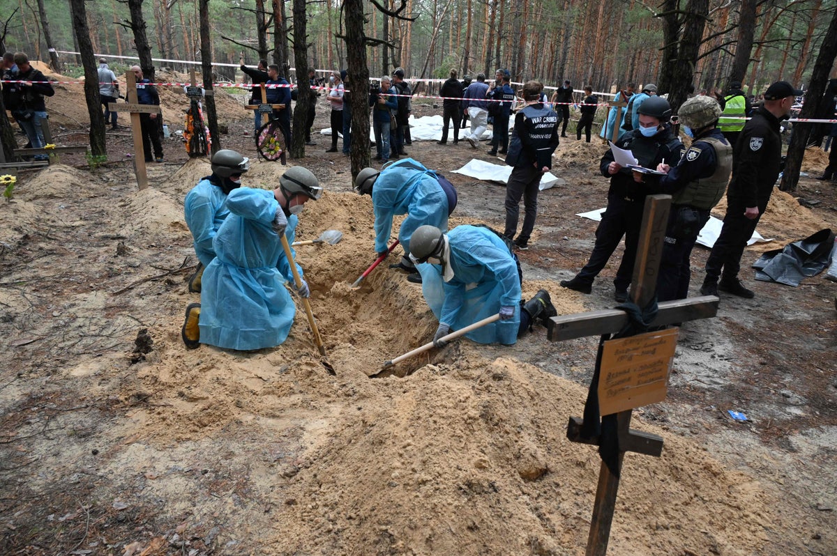 ‘Tortured, shot, killed’: Zelensky accuses Russia of genocide after Izyum mass grave discovered