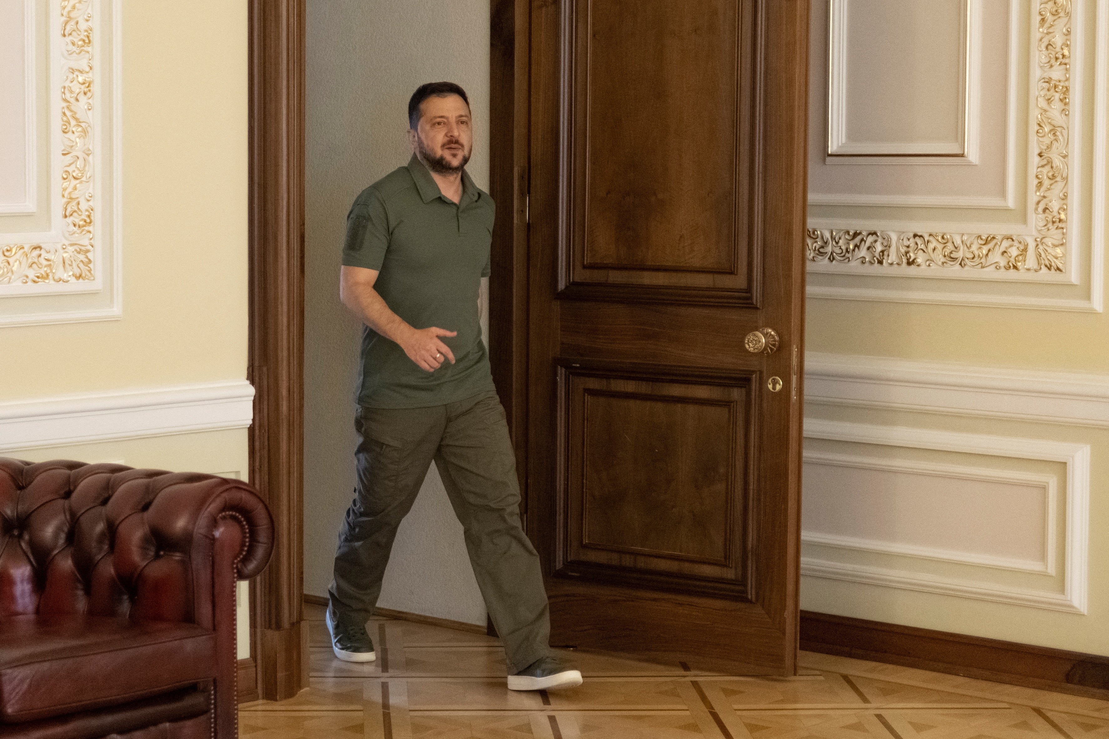 Ukraine’s president, Volodymyr Zelensky, arrives for an interview with reporters in Kyiv on 16 September