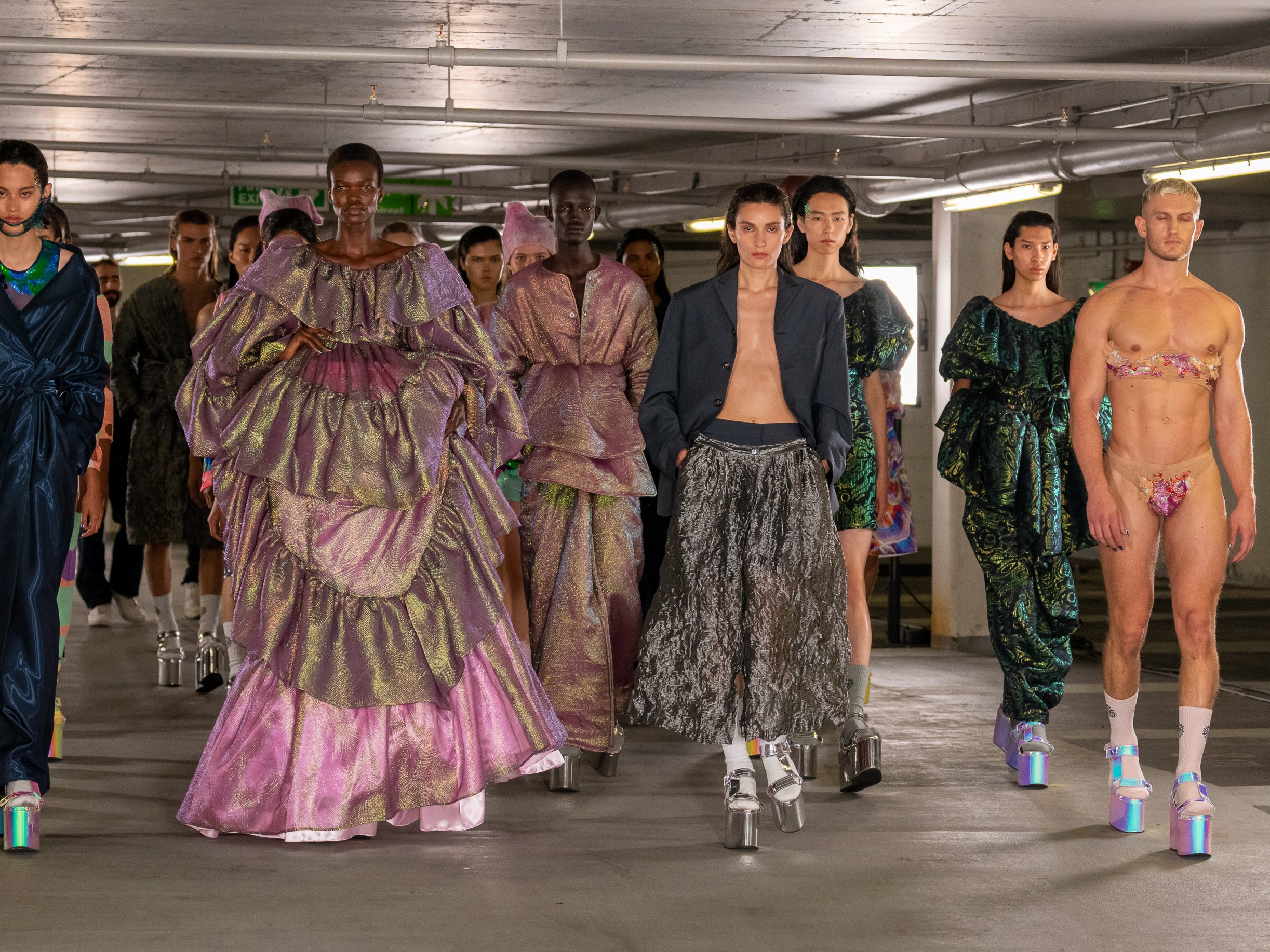 Edward Crutchley’s show, three storeys deep in an echoey car park, showcased his mastery of fabric