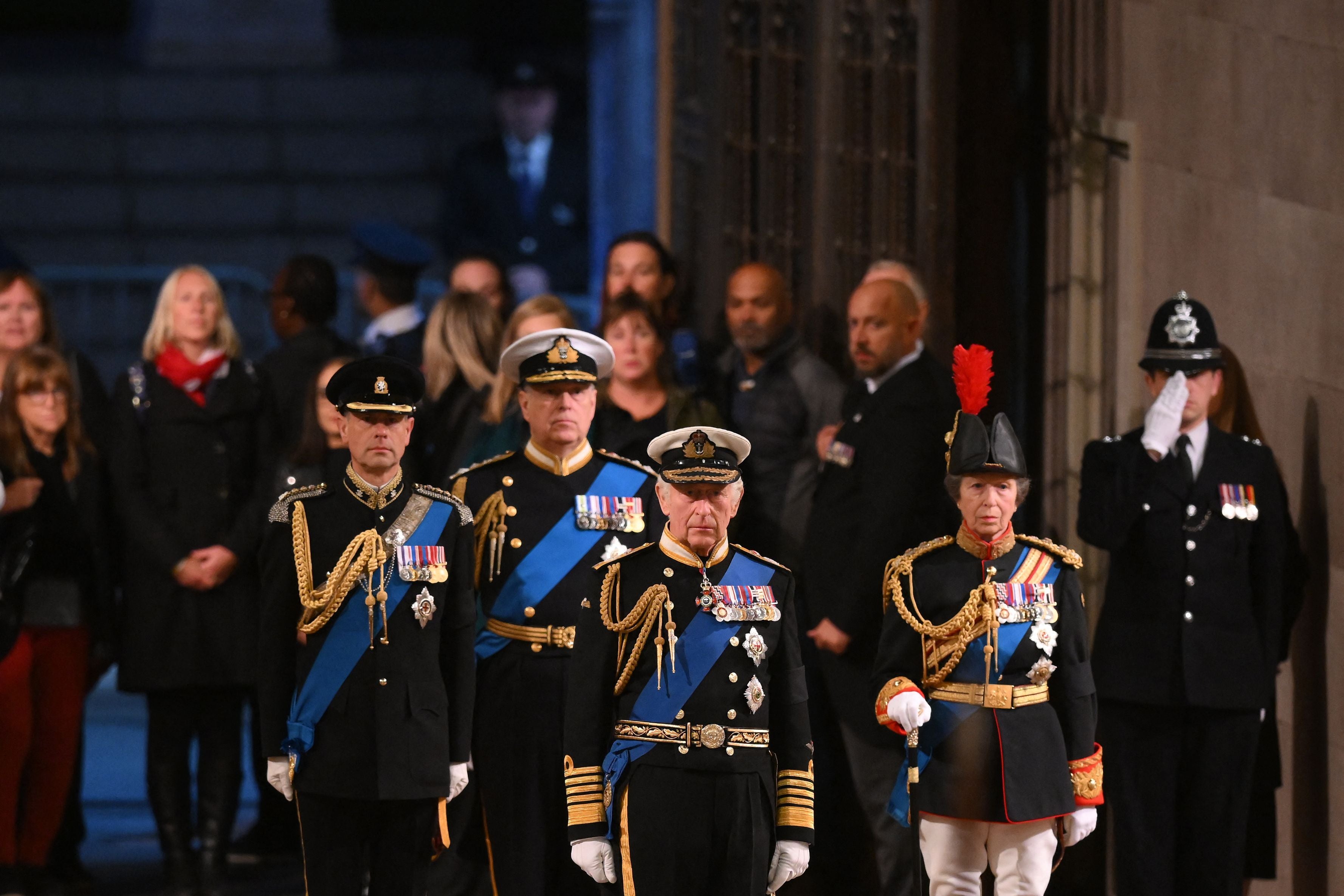 Inside Westminster Hall, King Charles and his siblings stood guard at the coffin