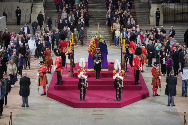 King Charles III, the Princess Royal, the Duke of York and the Earl of Wessex hold a vigil beside the coffin of their mother (Yui Mok/PA)