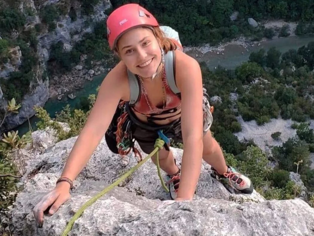 Maya Humeau, 22, rock climbing in Colorado. Ms Humeau died after she fell 100 feet while climbing in Colorado