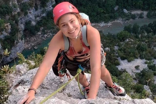 <p>Maya Humeau, 22, rock climbing in Colorado. Ms Humeau died after she fell 100 feet while climbing in Colorado</p>