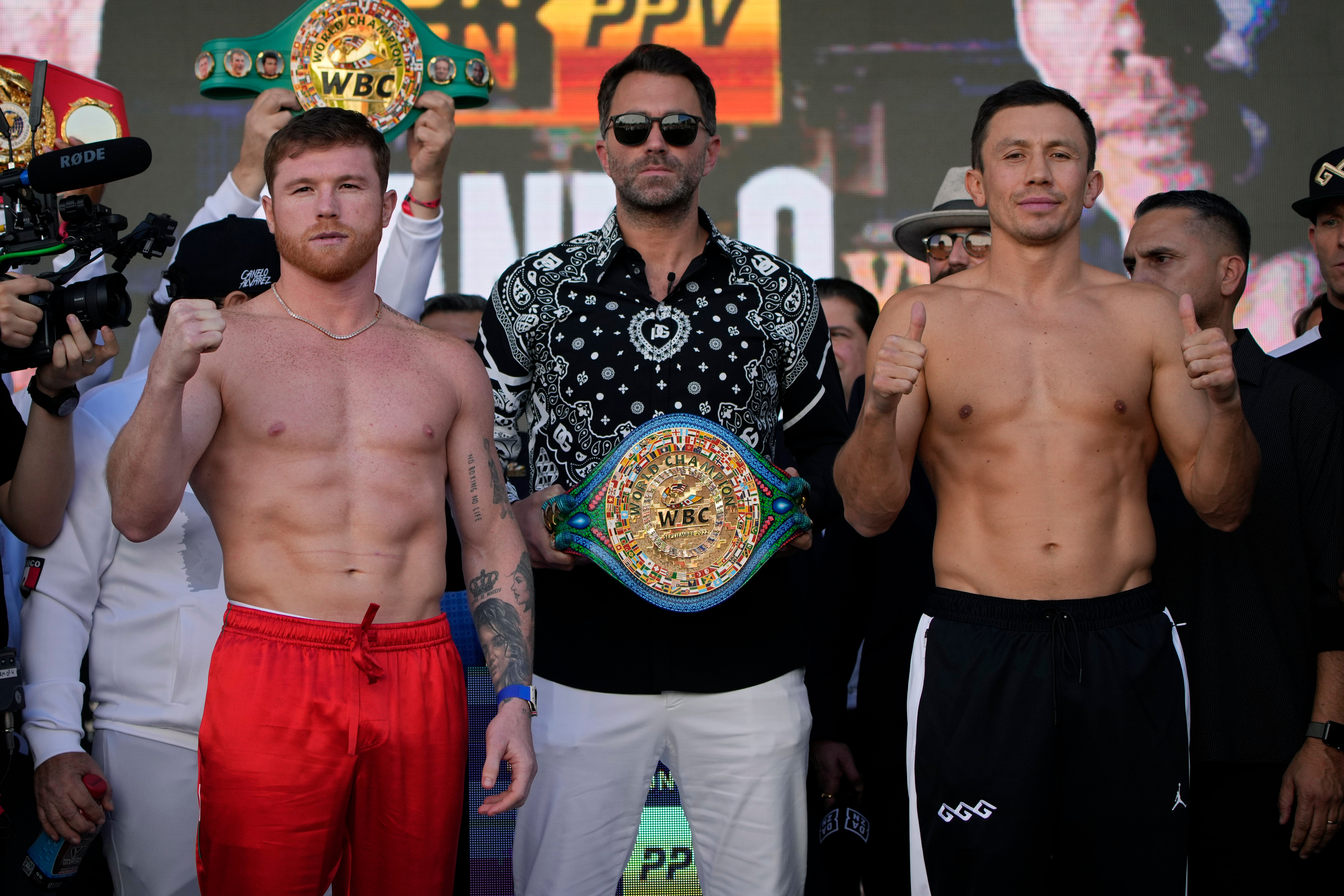 Saul ‘Canelo’ Alvarez (left) and rival Gennady Golovkin at the public weigh-ins