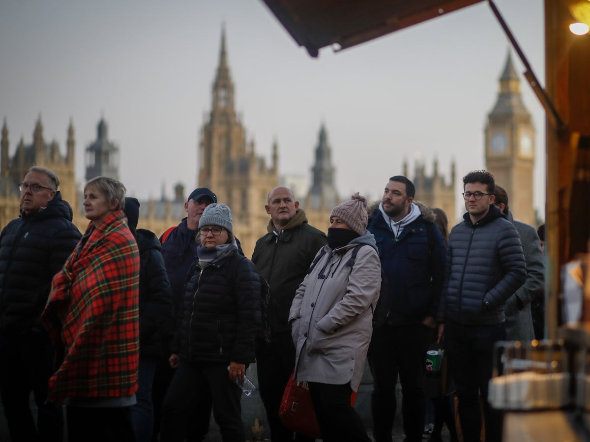 Queen queue – live: Mourners warned of 16-hour wait as man in custody after approaching coffin