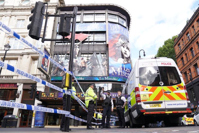 Police at the scene in Shaftesbury Avenue, central London (PA)