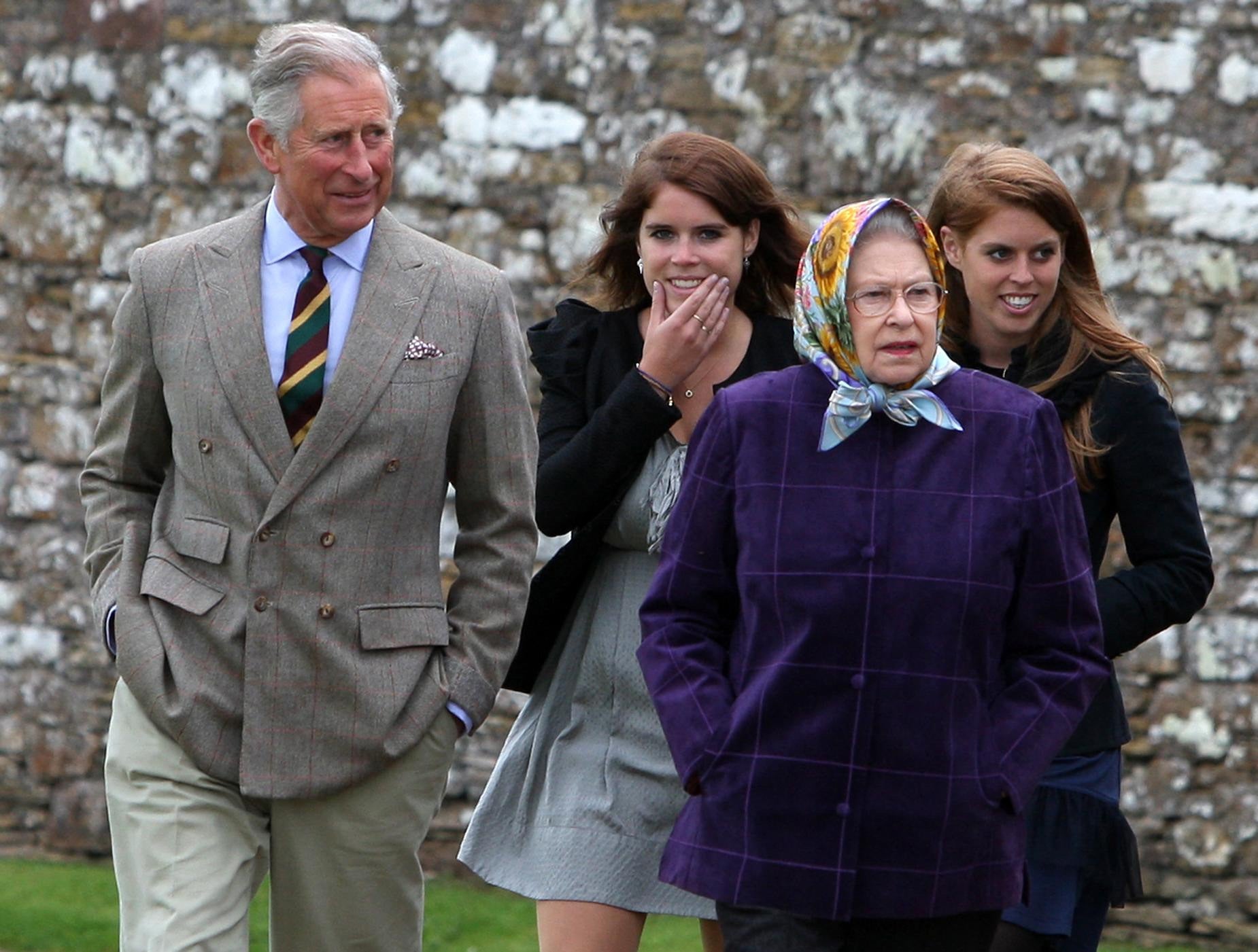 The Queen with the Prince of Wales (left), Princess Eugenie, (back left), and Princess Beatrice (back right) and the rest of the Royal family at the Castle of Mey after disembarking the Hebridean Princess boat after a private family holiday with Queen Elizabeth II around the Western Isles of Scotland.