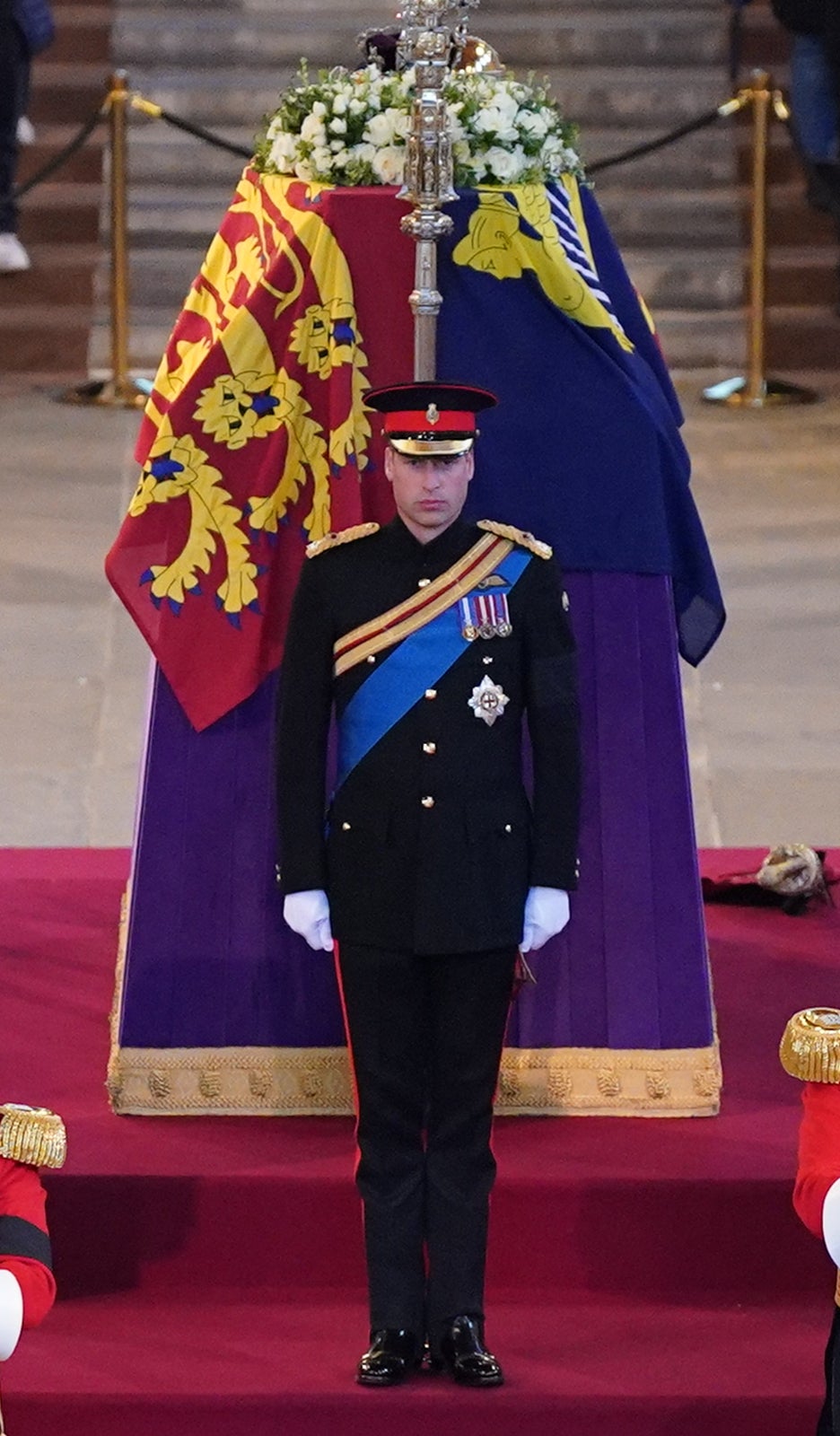 The Prince of Wales stands vigil at the head of the coffin of his late grandmother
