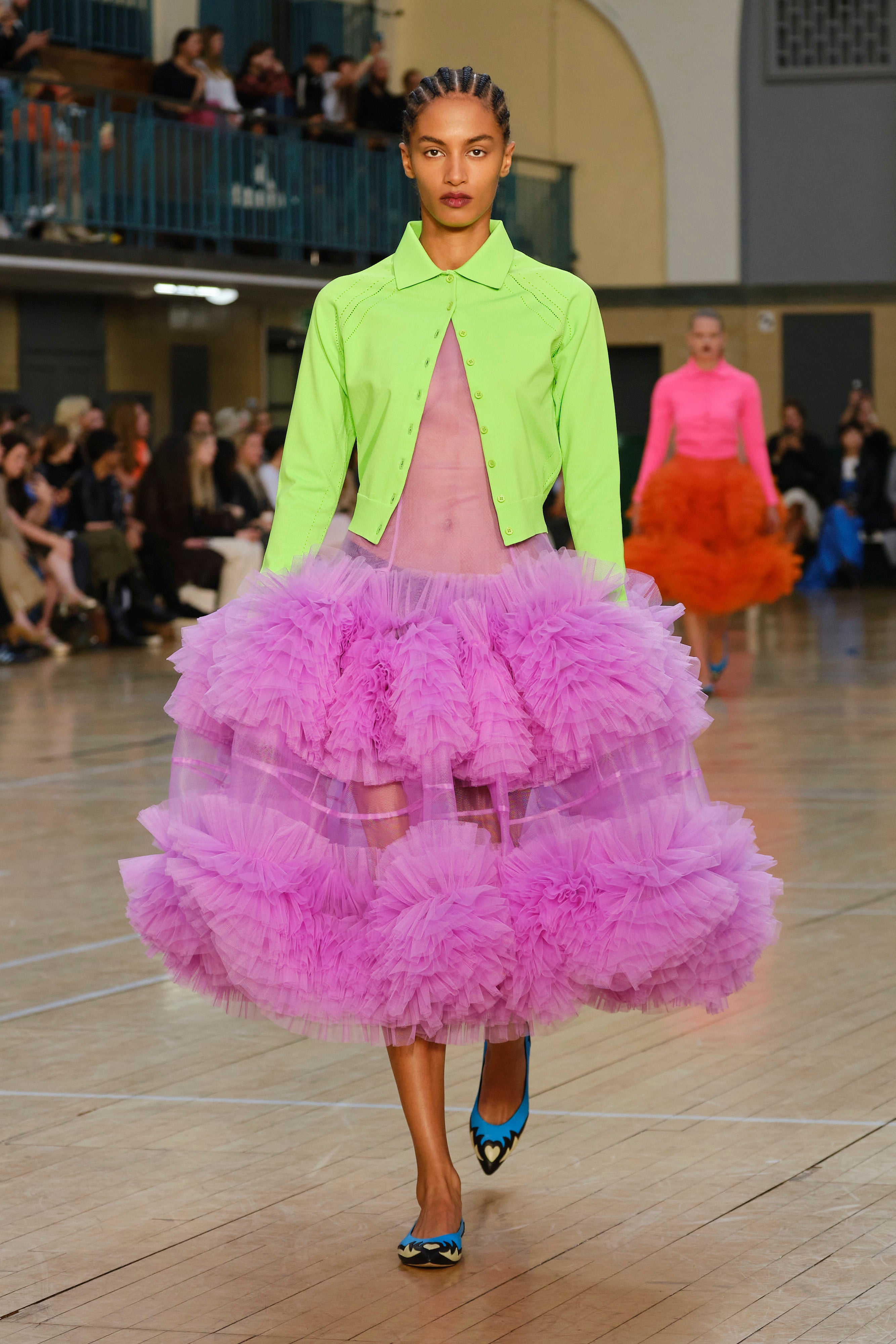 Dressed to frill: a typically colourful Goddard creation is modelled