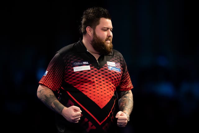 Michael Smith, pictured, had finished runner-up to Peter Wright in the PDC World Championship final (Aaron Chown/PA)