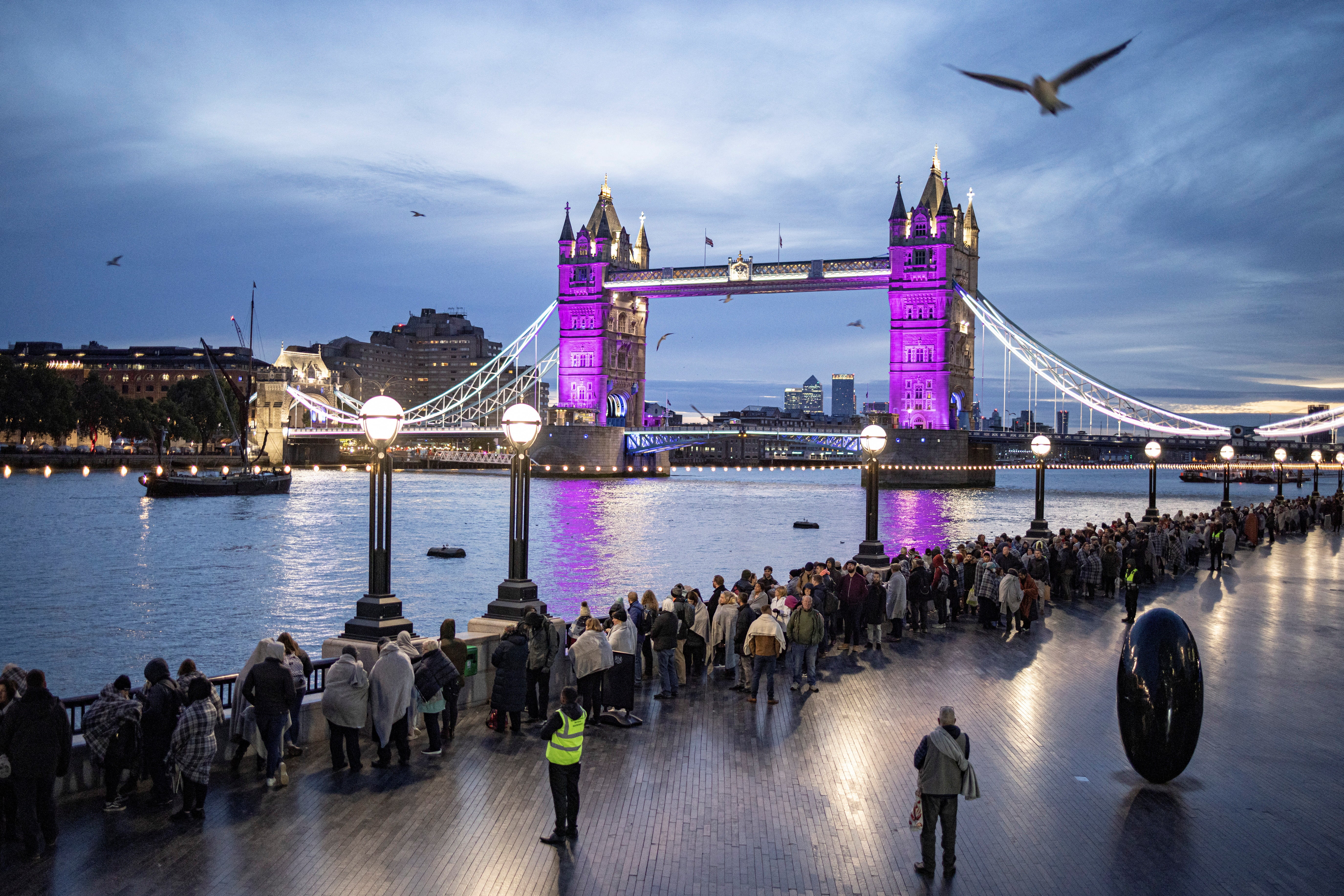 People queue along the South Bank to pay their respects to the the late Queen Elizabeth