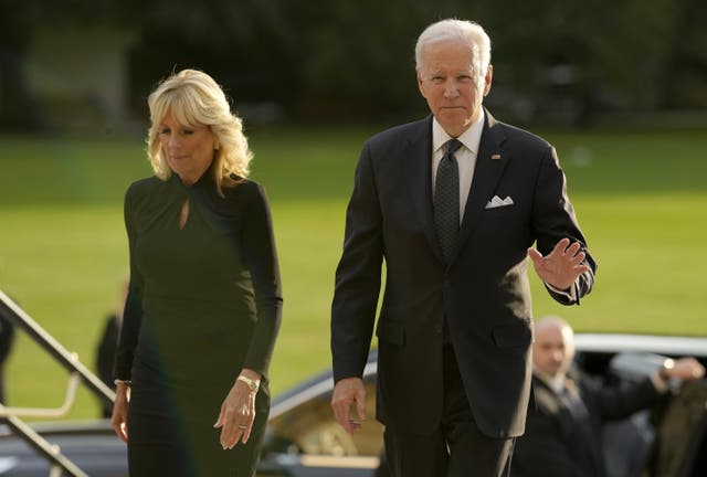 US President Joe Biden accompanied by the First Lady Jill Biden arrive for a reception hosted by the King (Markus Schreiber/PA)
